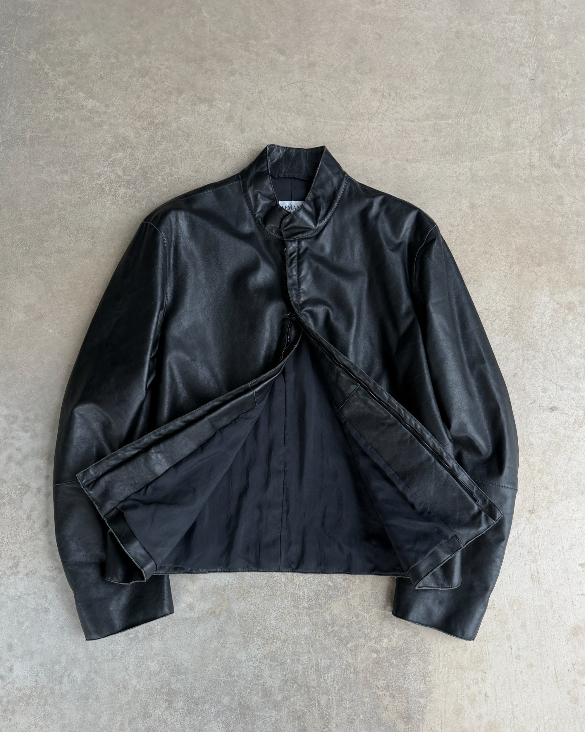 Armani Collezioni Calfskin Leather Jacket – M–L-on a concrete background