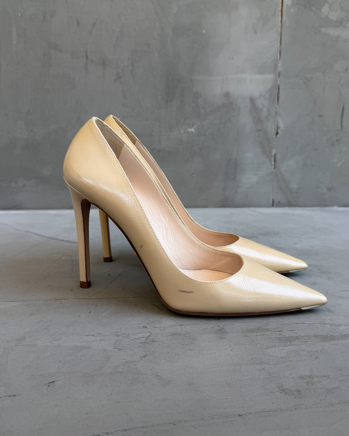 Prada Cream Leather High Heels – EU 37.5-on a concrete background