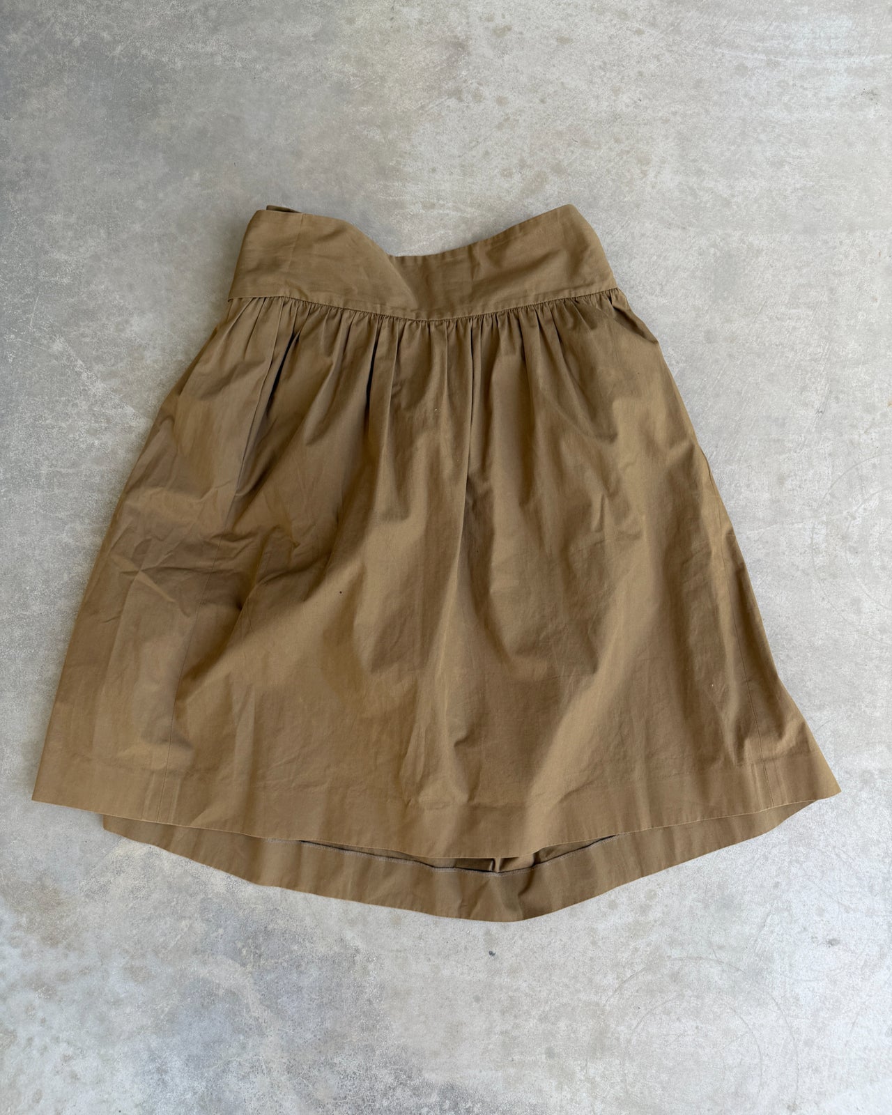 Chloé Cotton Wrap Tie Waist Midi Skirt-on a concrete background