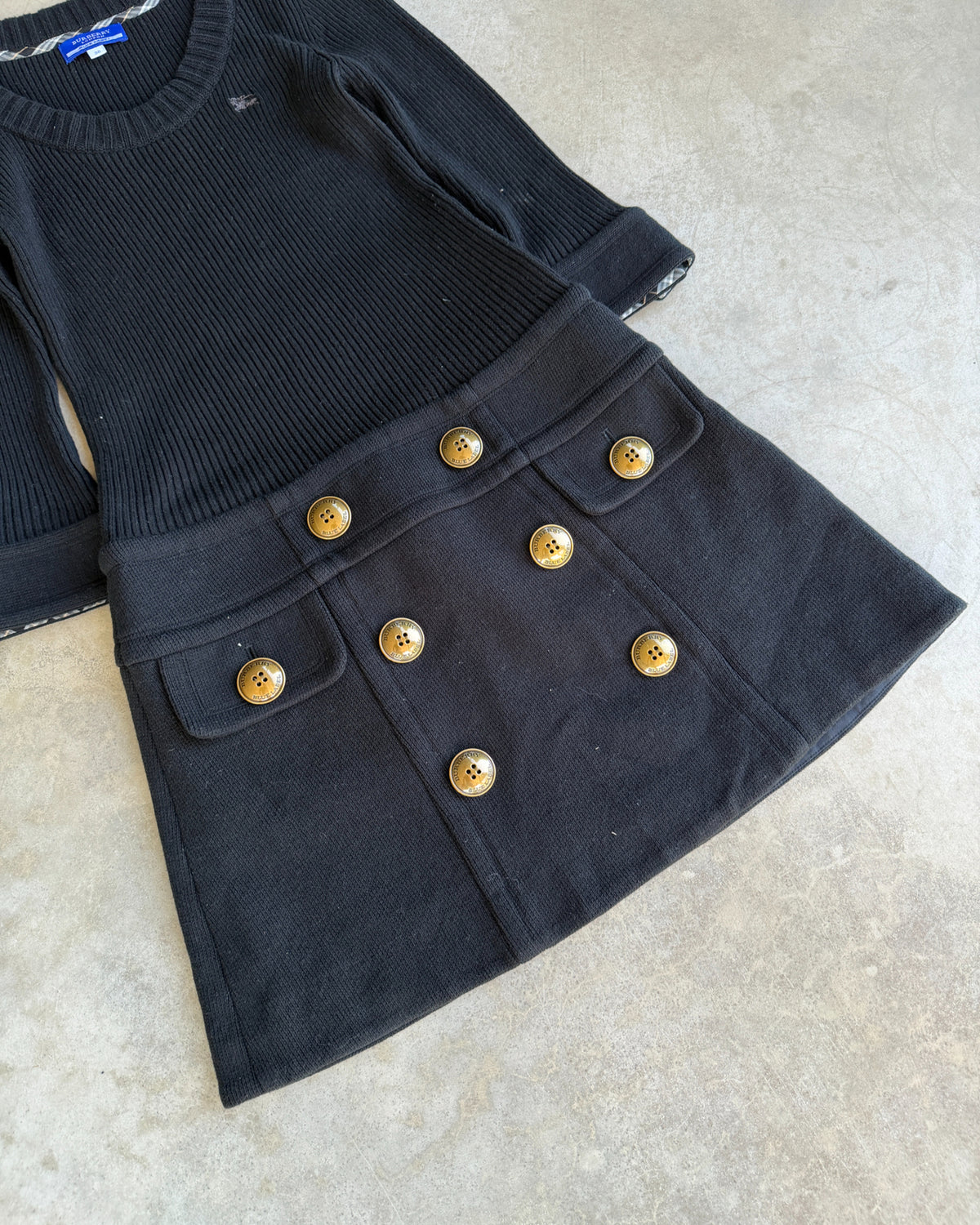 Burberry Blue Label Black Wool Mini Dress-on a concrete background