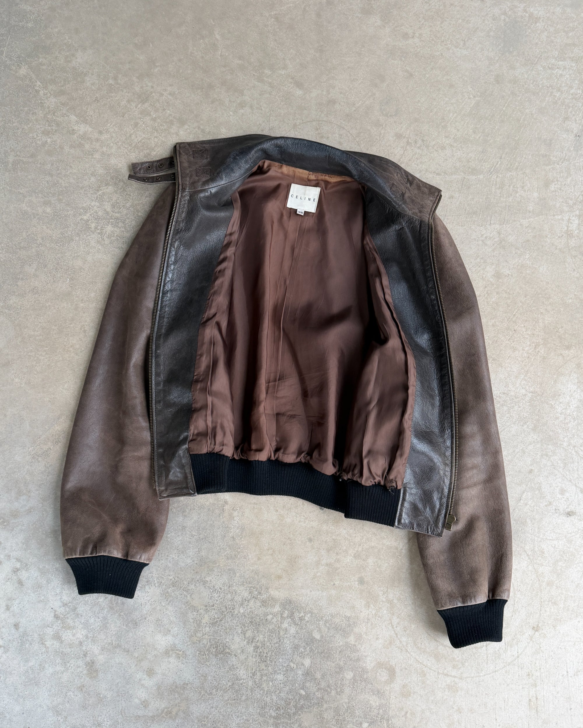 Celine Early 2000s Sheep Leather Bomber Jacket – S-on a concrete background