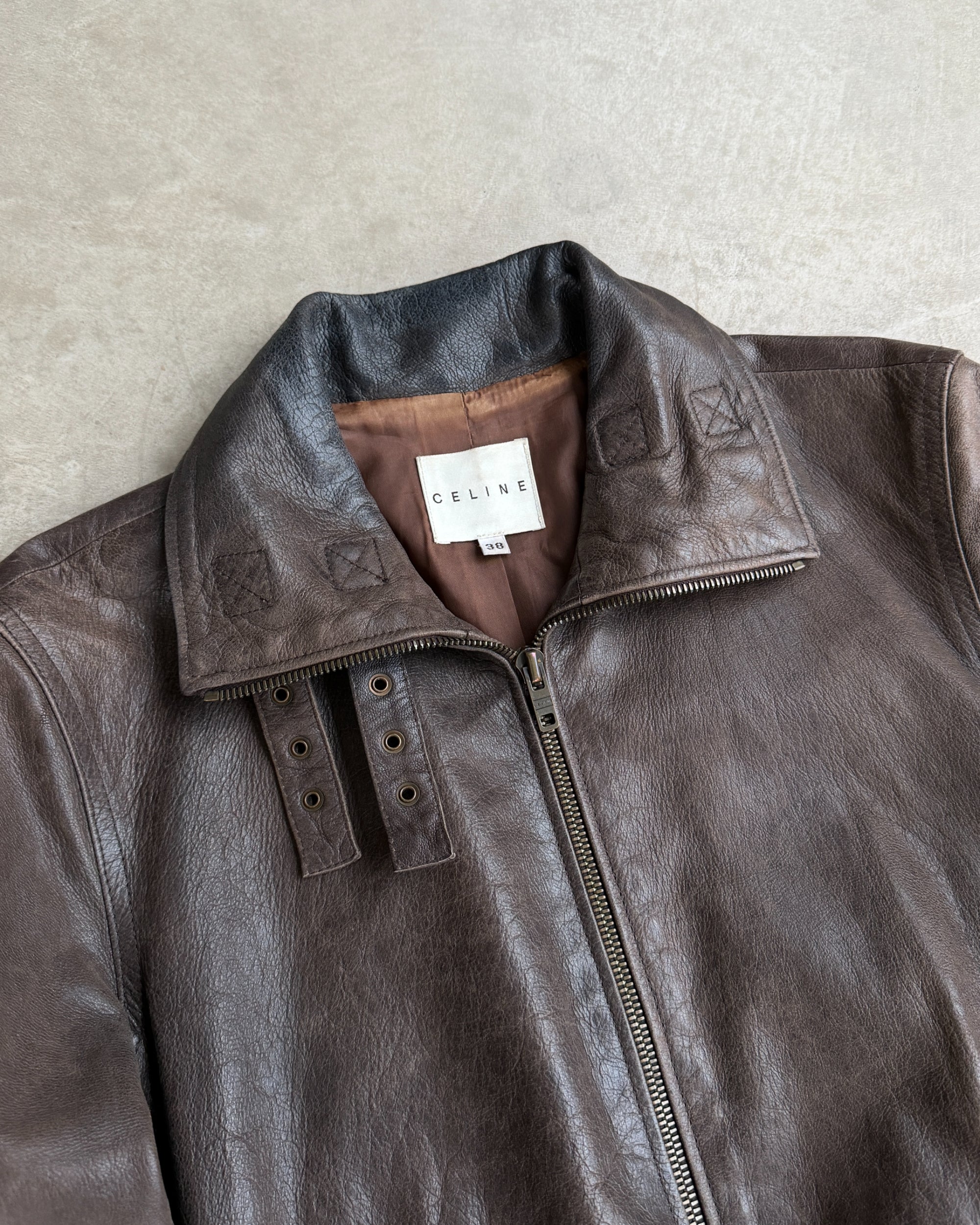 Celine Early 2000s Sheep Leather Bomber Jacket – S-on a concrete background