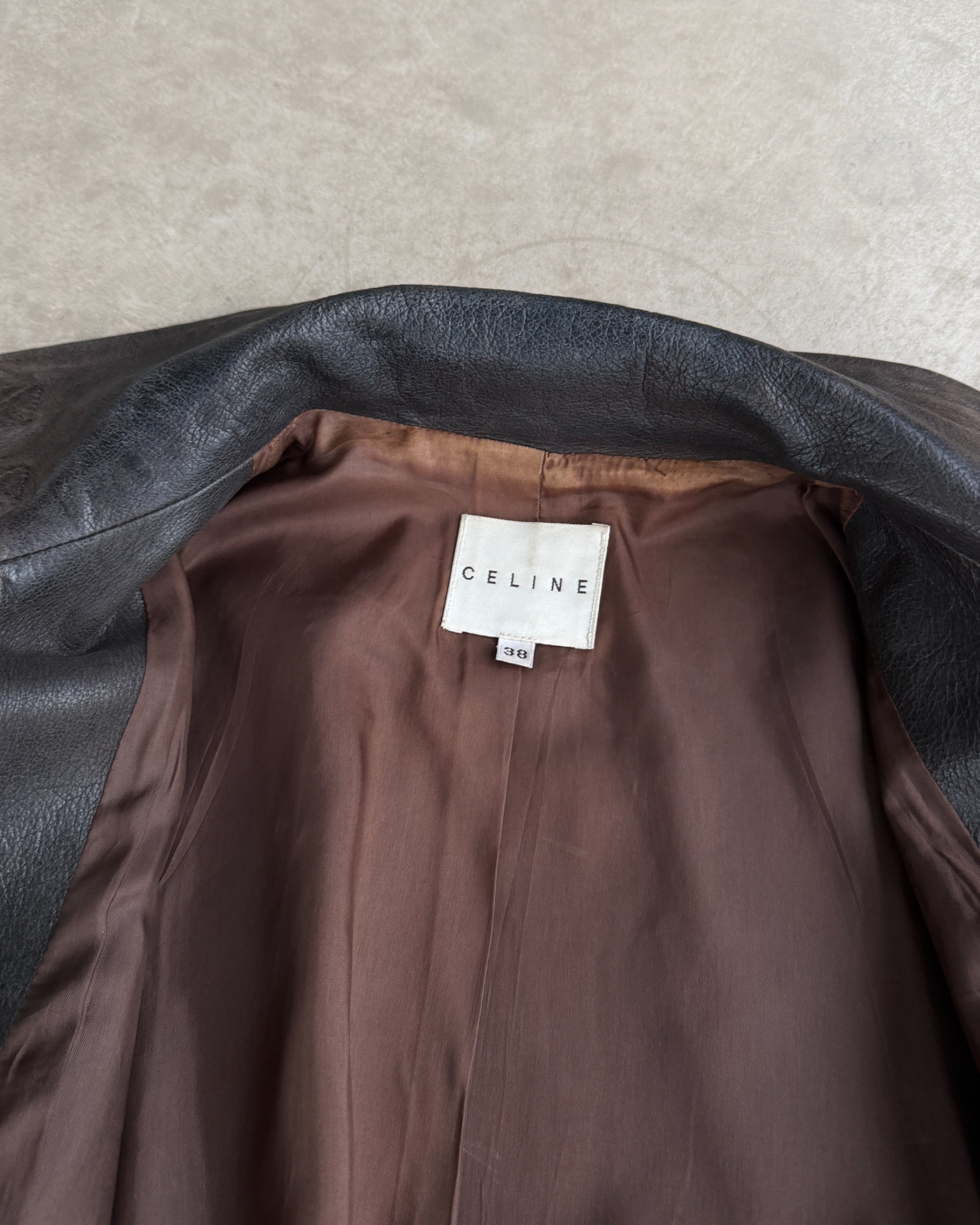 Celine Early 2000s Sheep Leather Bomber Jacket – S-on a concrete background