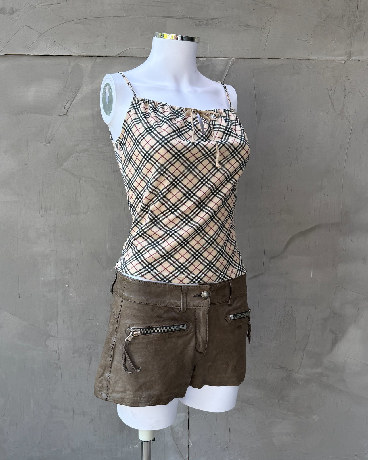 Burberry Blue Label Nova Print Vest Top – M-on a concrete background