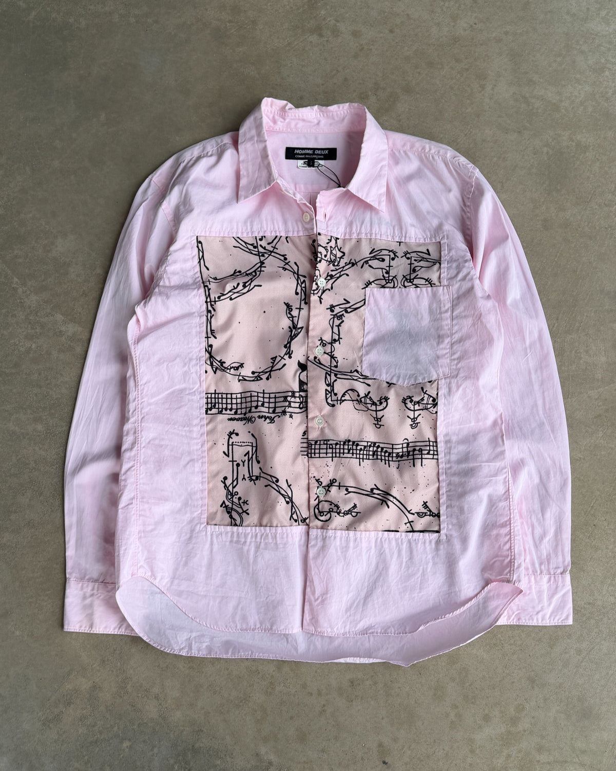 Comme des Garçons Homme Deux AW19 Shirt – S-on a concrete background