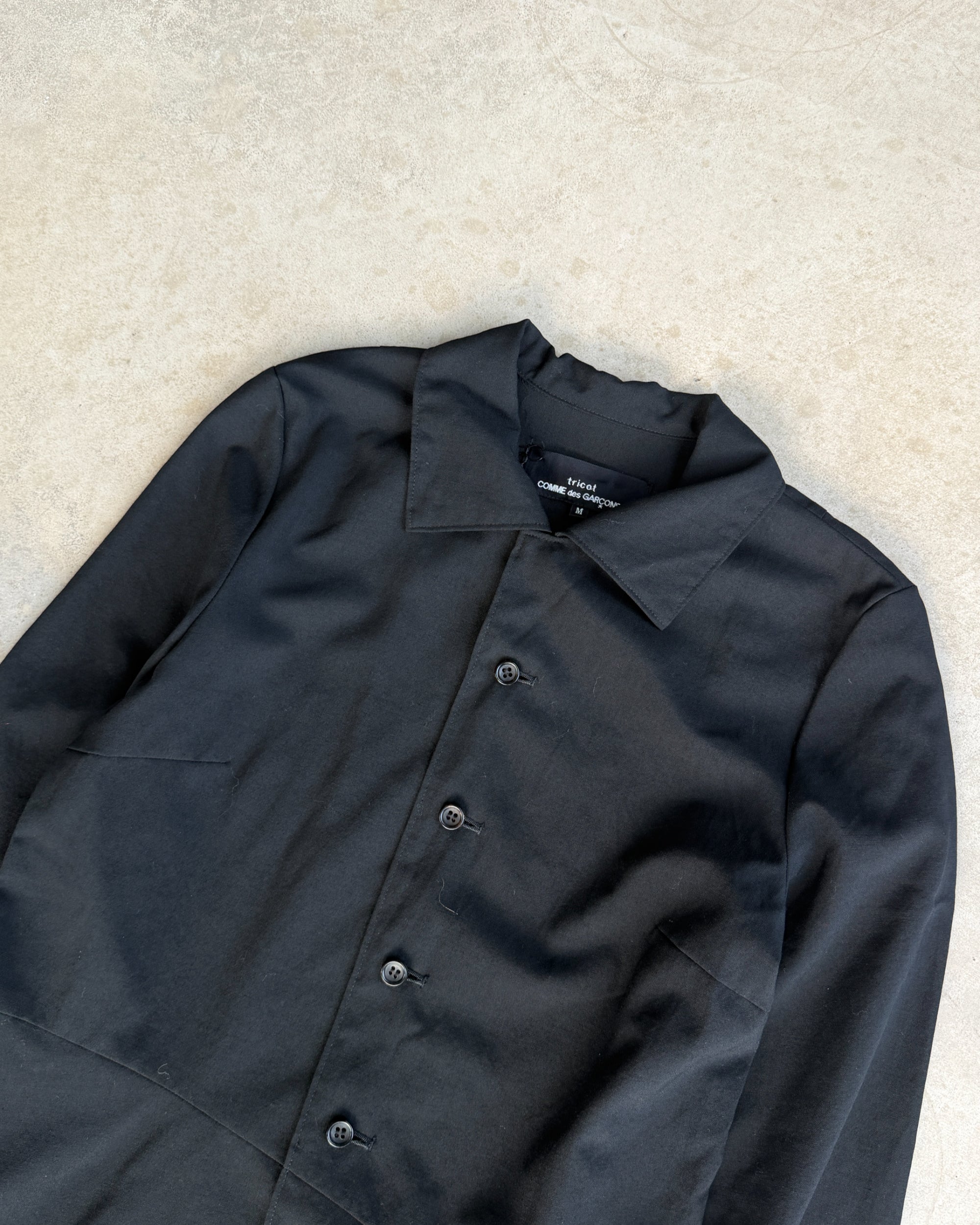 Comme des Garçons Tricot FW93 Wool Overcoat Dress – M-on a concrete background