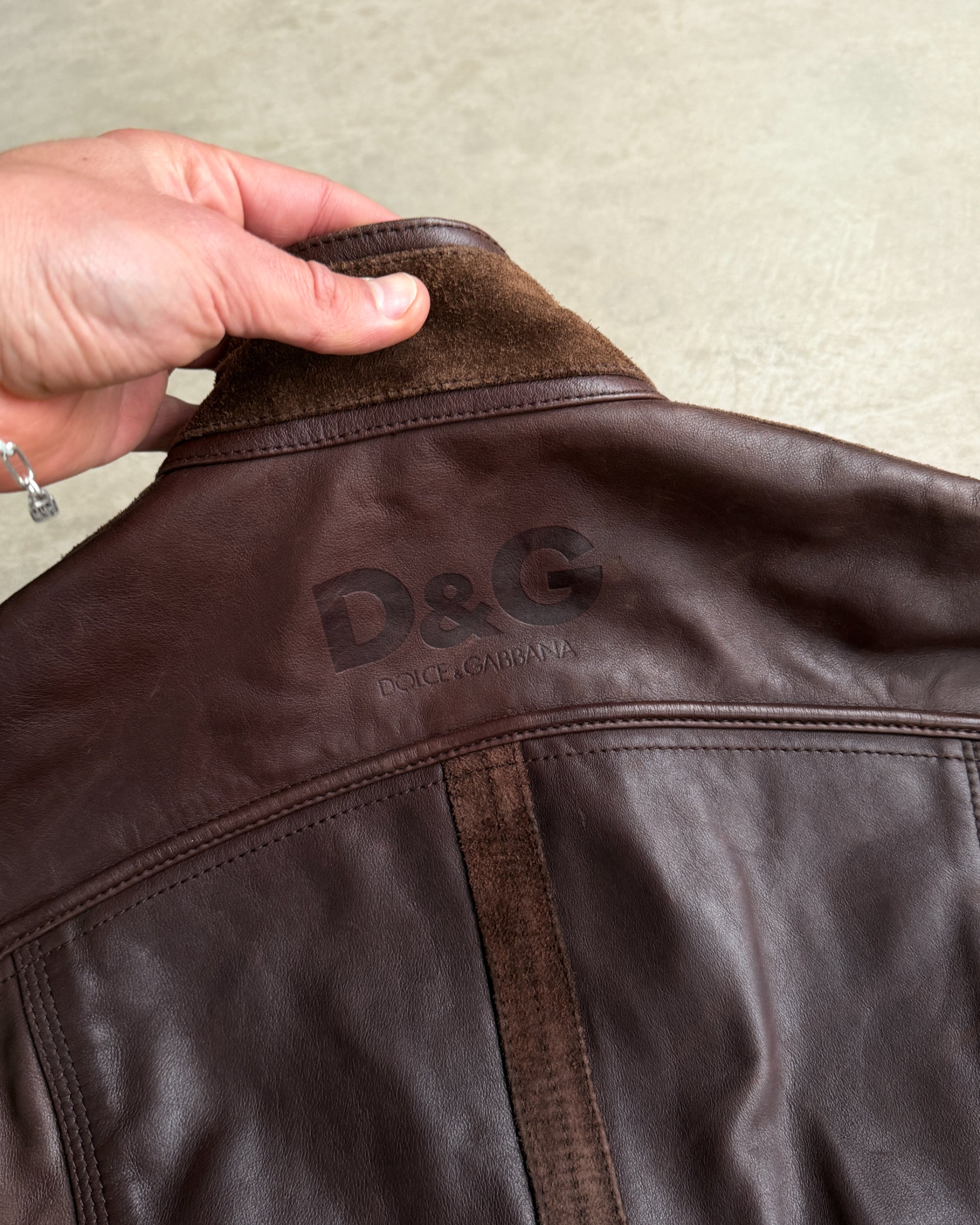 Dolce and Gabbana D&G Leather and Suede Riders Jacket – M-on a concrete background