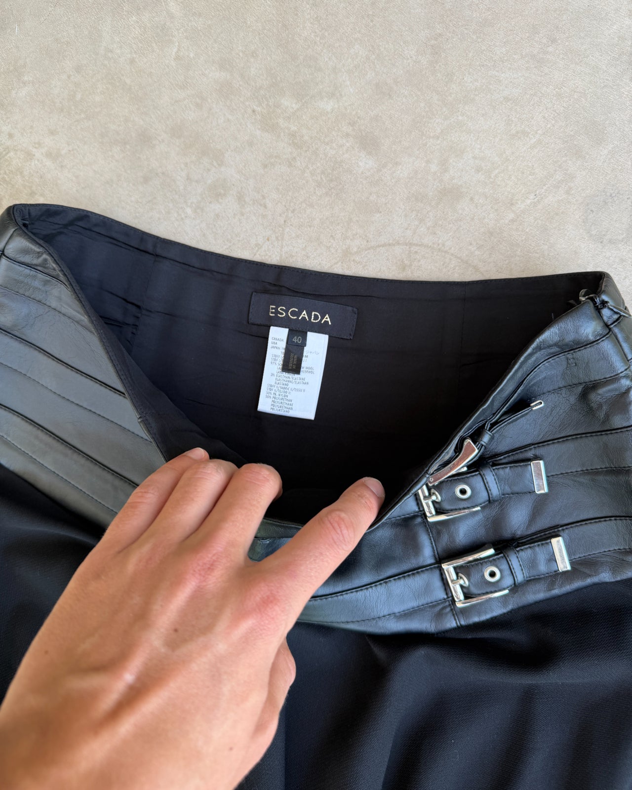 Escada Wool and Leather Waistband Midi Skirt – S/M-on a concrete background