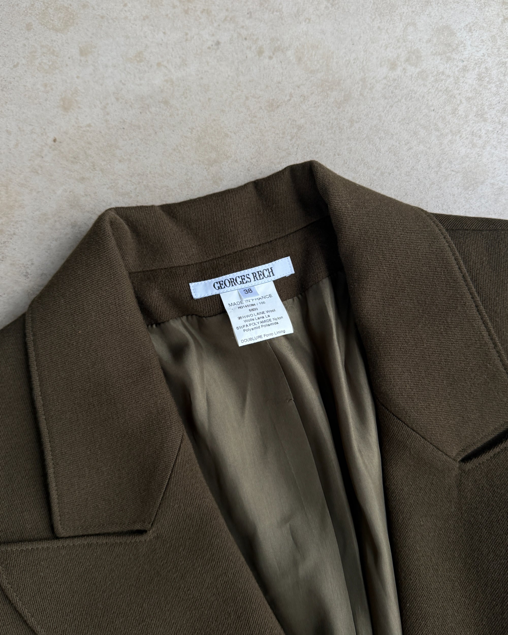 Georges Rech Wool Blazer Jacket with Brass Ring Closure – S-on a concrete background