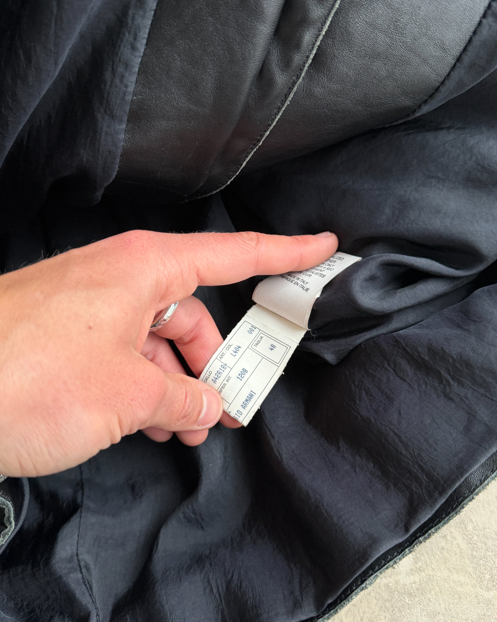 Armani Collezioni Calfskin Leather Jacket – M–L-on a concrete background