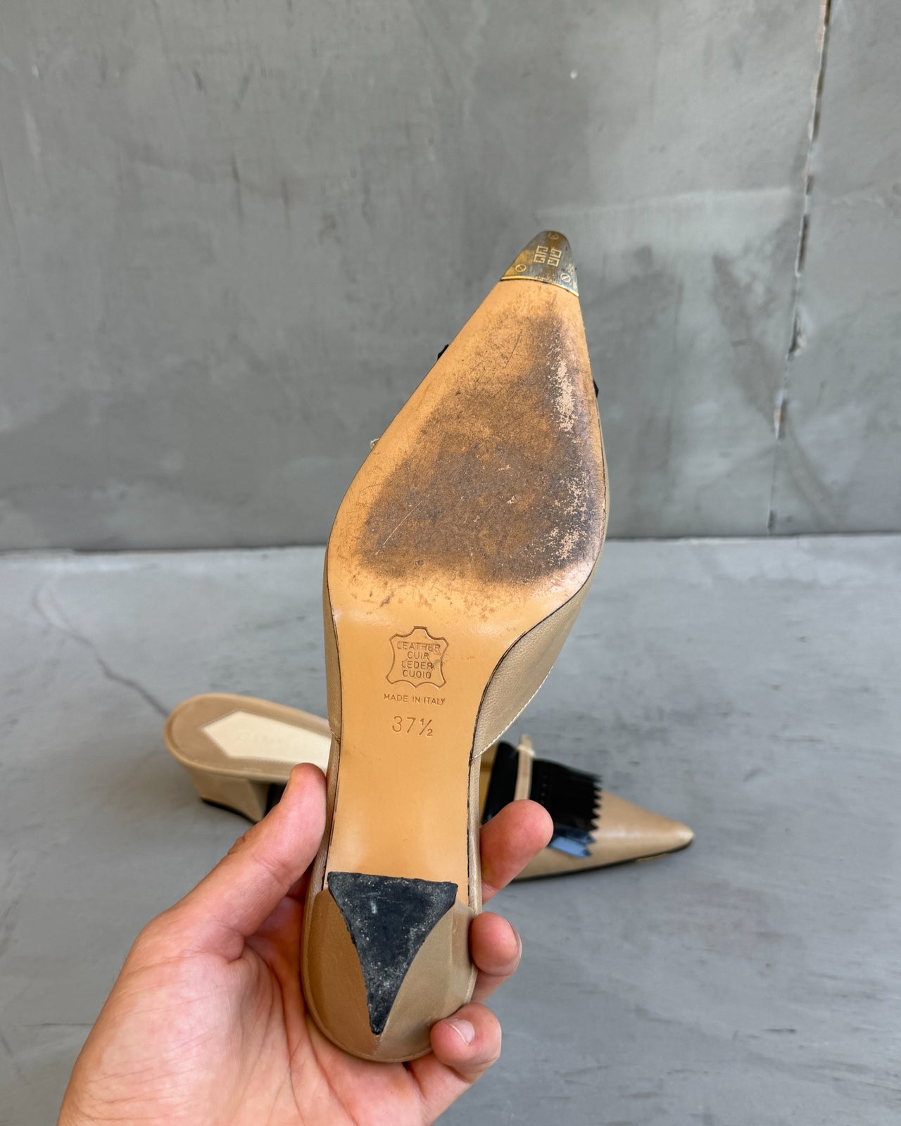 Givenchy Beige Leather Kitten Heel Mule – EU 37.5-on a concrete background