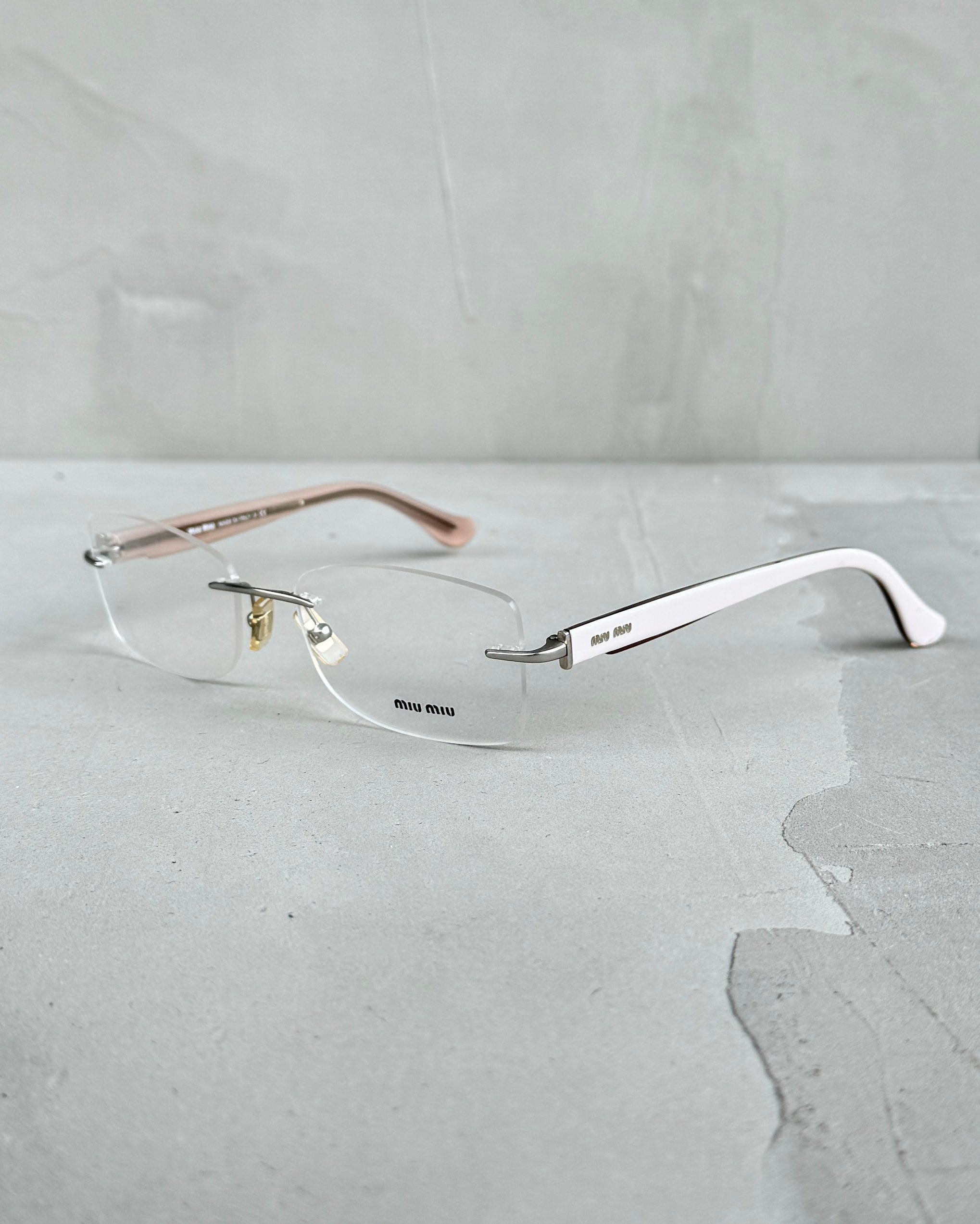 MIU MIU RIMLESS LENS BAYONETTA EYE GLASSES