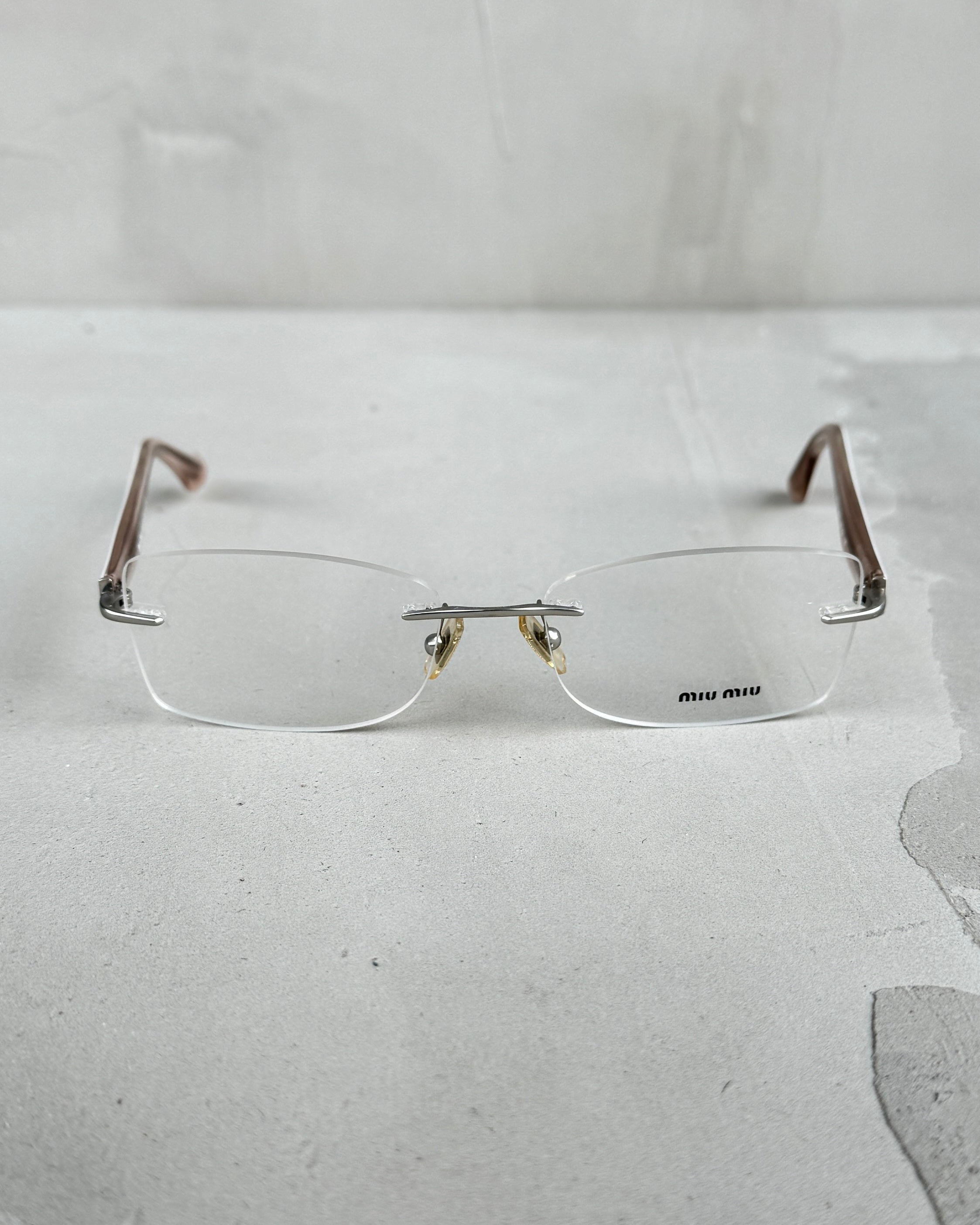 MIU MIU RIMLESS LENS BAYONETTA EYE GLASSES