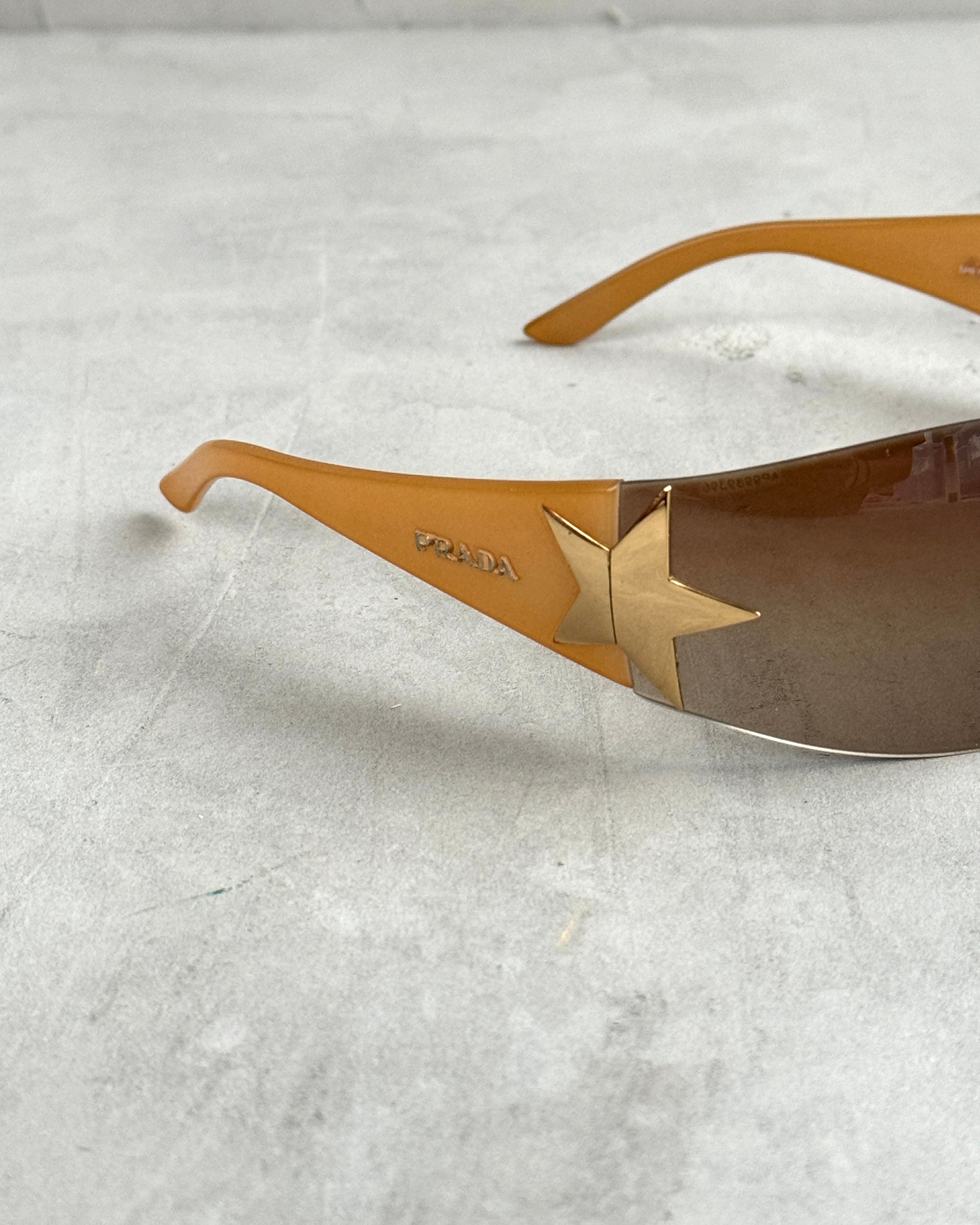 PRADA WRAP AROUND STAR SUNGLASSES