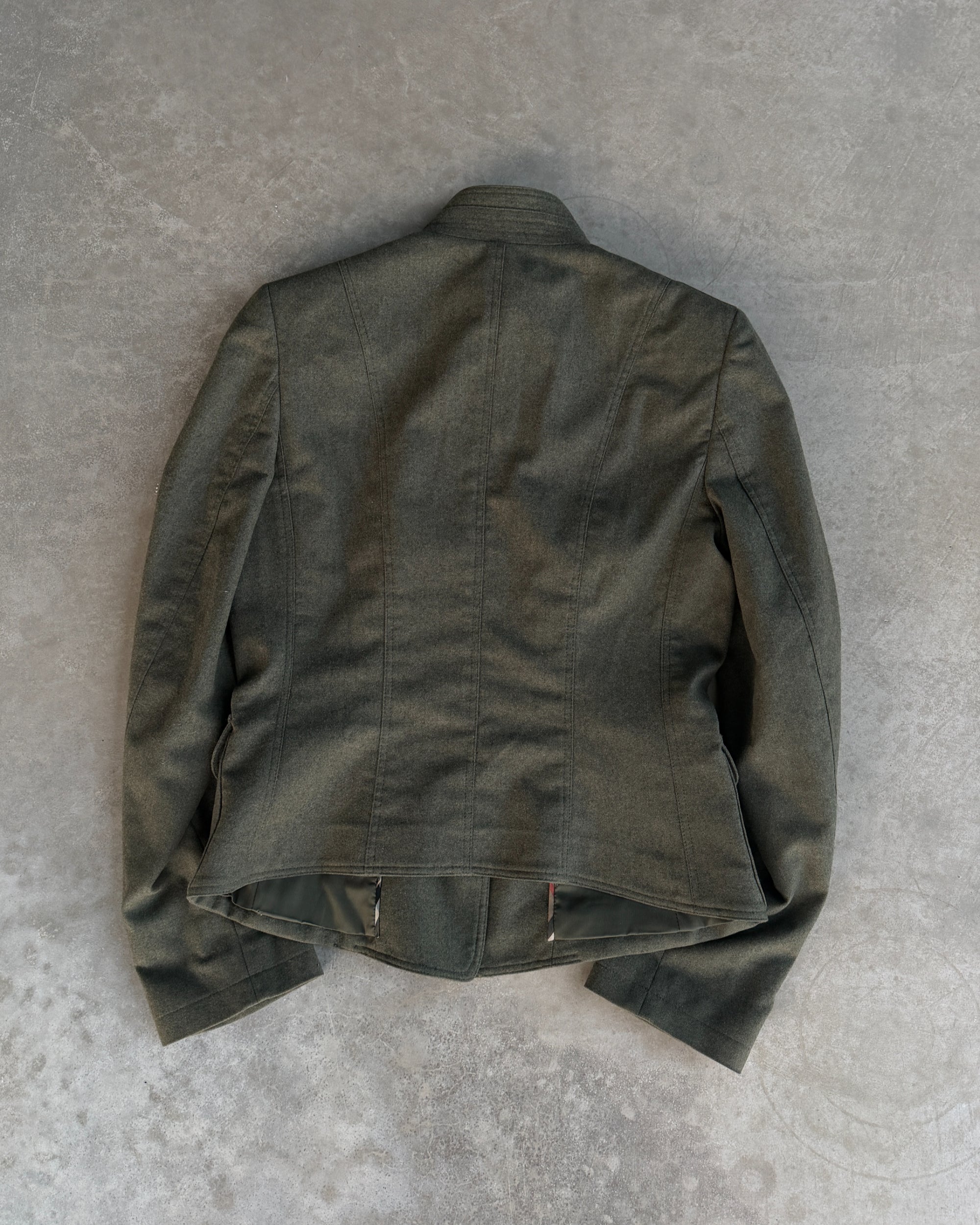 Burberry Wool and Cashmere Military Jacket – S-on a concrete background