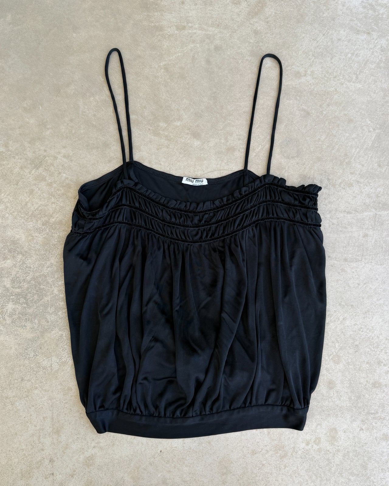 Miu Miu Black Acetate Nylon Blend Top – S-on a concrete background