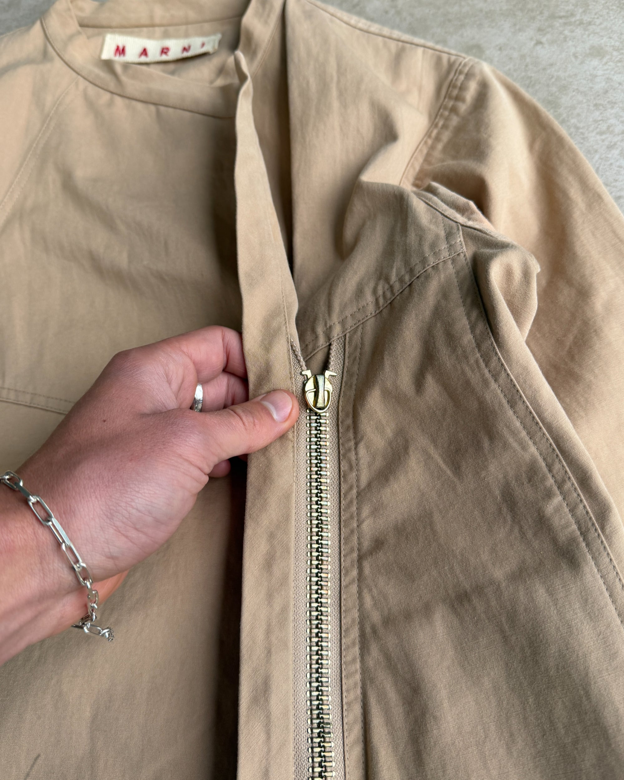 Marni Asymmetric Zip-Up Cotton Jacket – M-on a concrete background