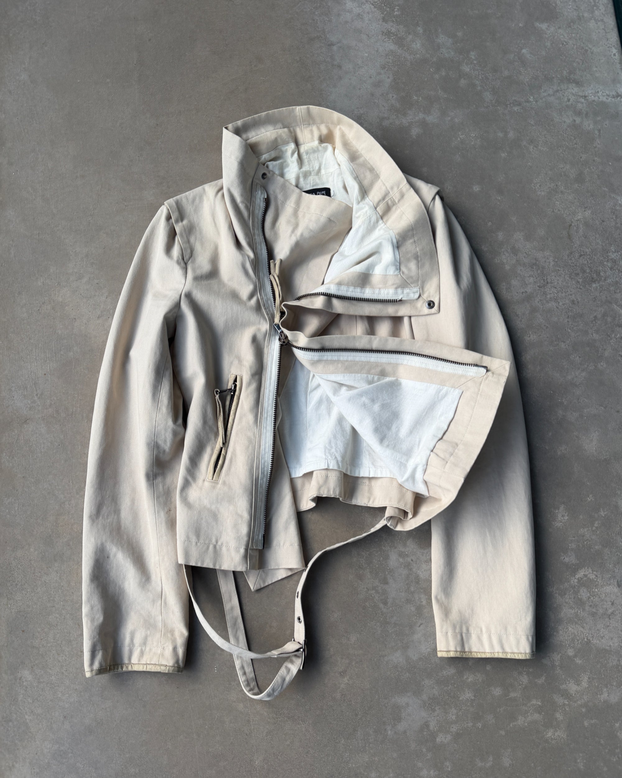 Patrizia Pepe Asymmetric Cotton Jacket – M-on a concrete background