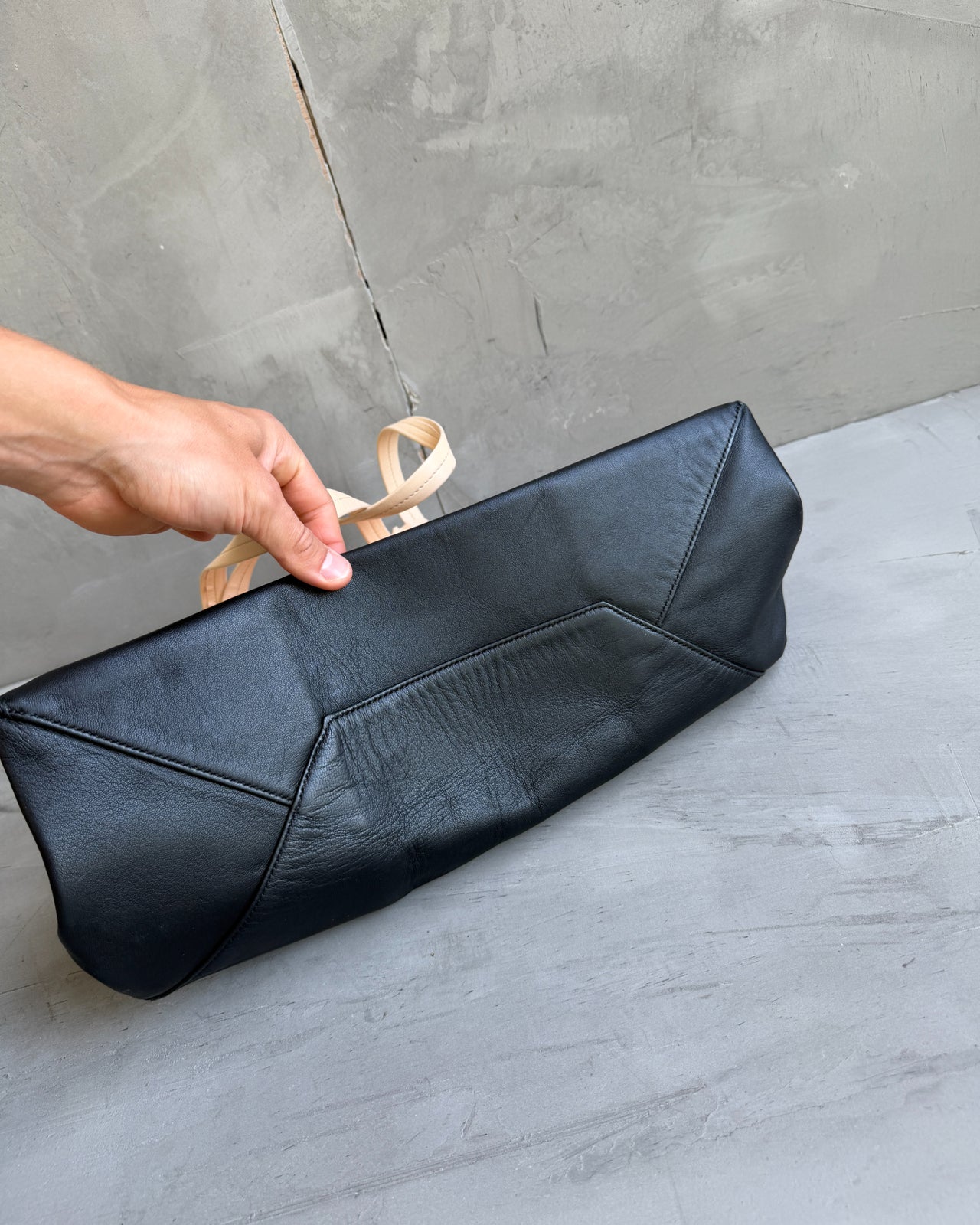 Celine Two Tone Leather Tote Bag-on a concrete background