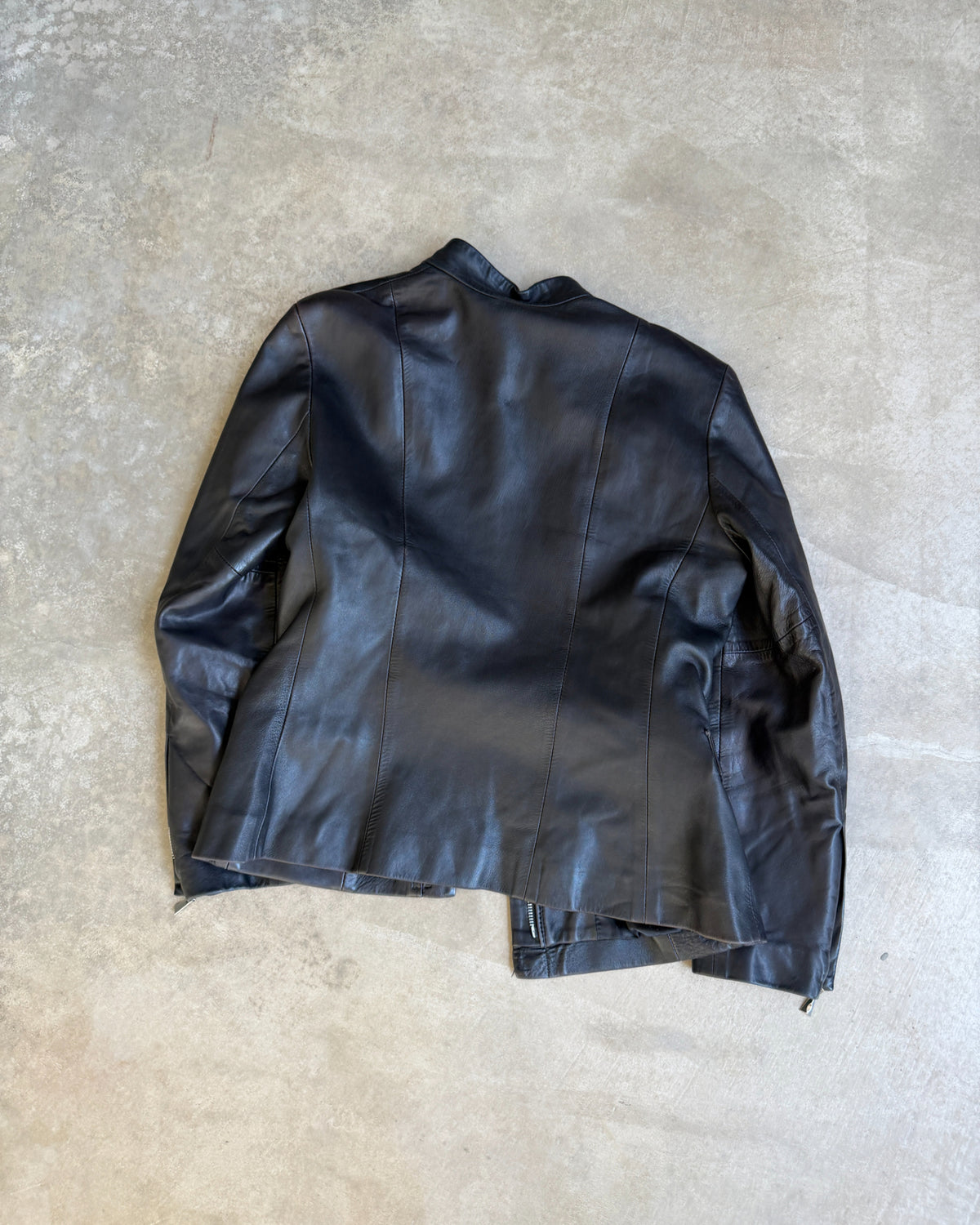 Giorgio Black Leather Jacket – XS/S-on a concrete background