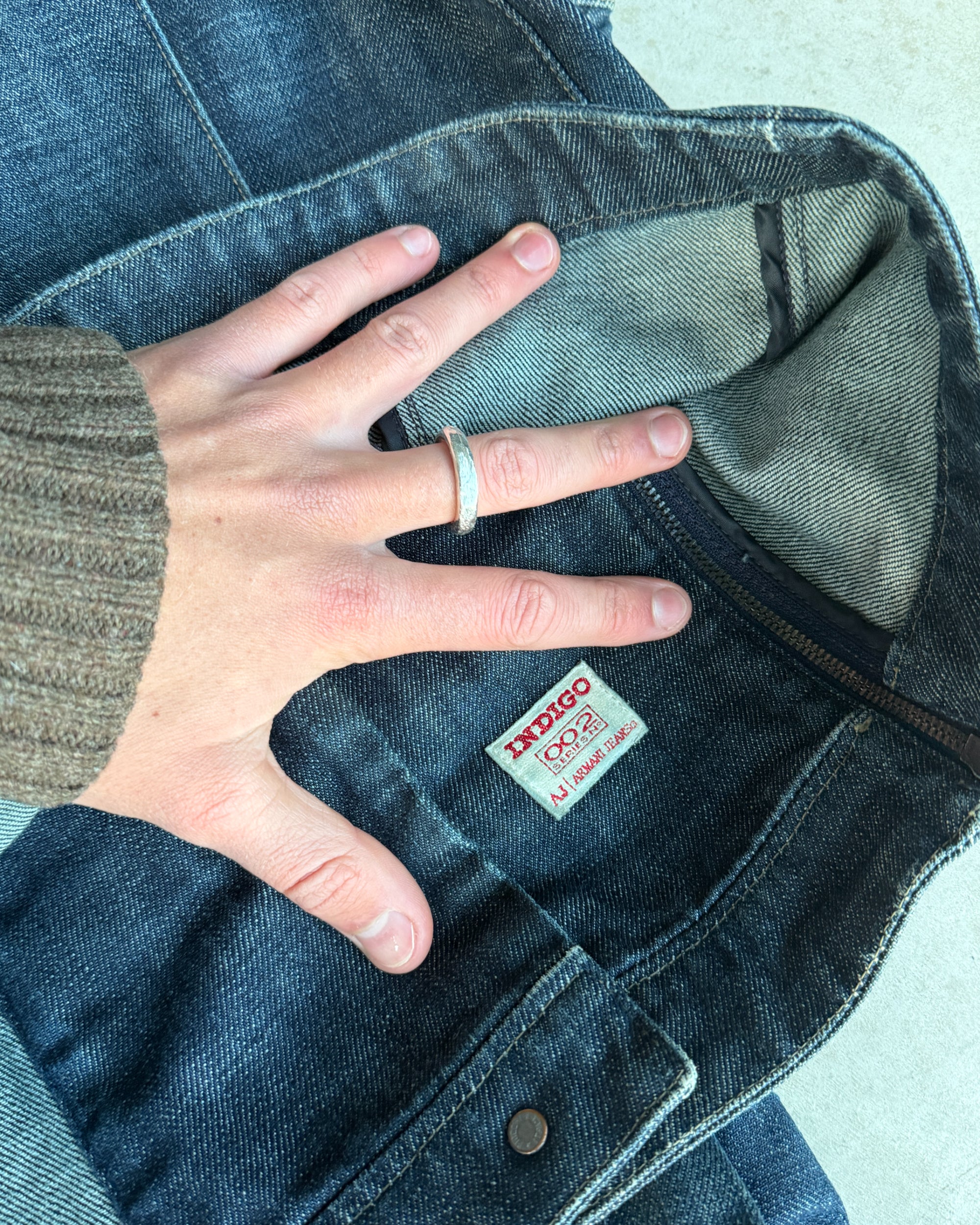 Armani Jeans Denim Military Buckle Jacket – S-on a concrete background