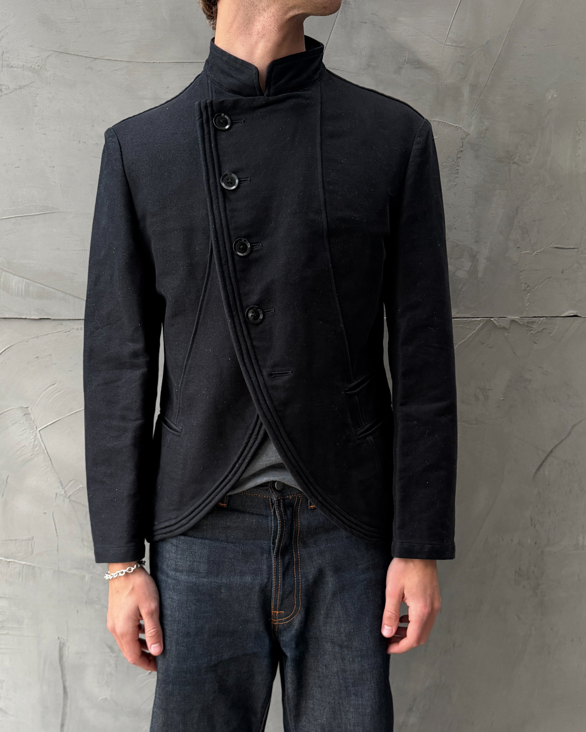 Yohji Yamamoto AW06 Asymmetric Cotton Jacket – S-on a concrete background