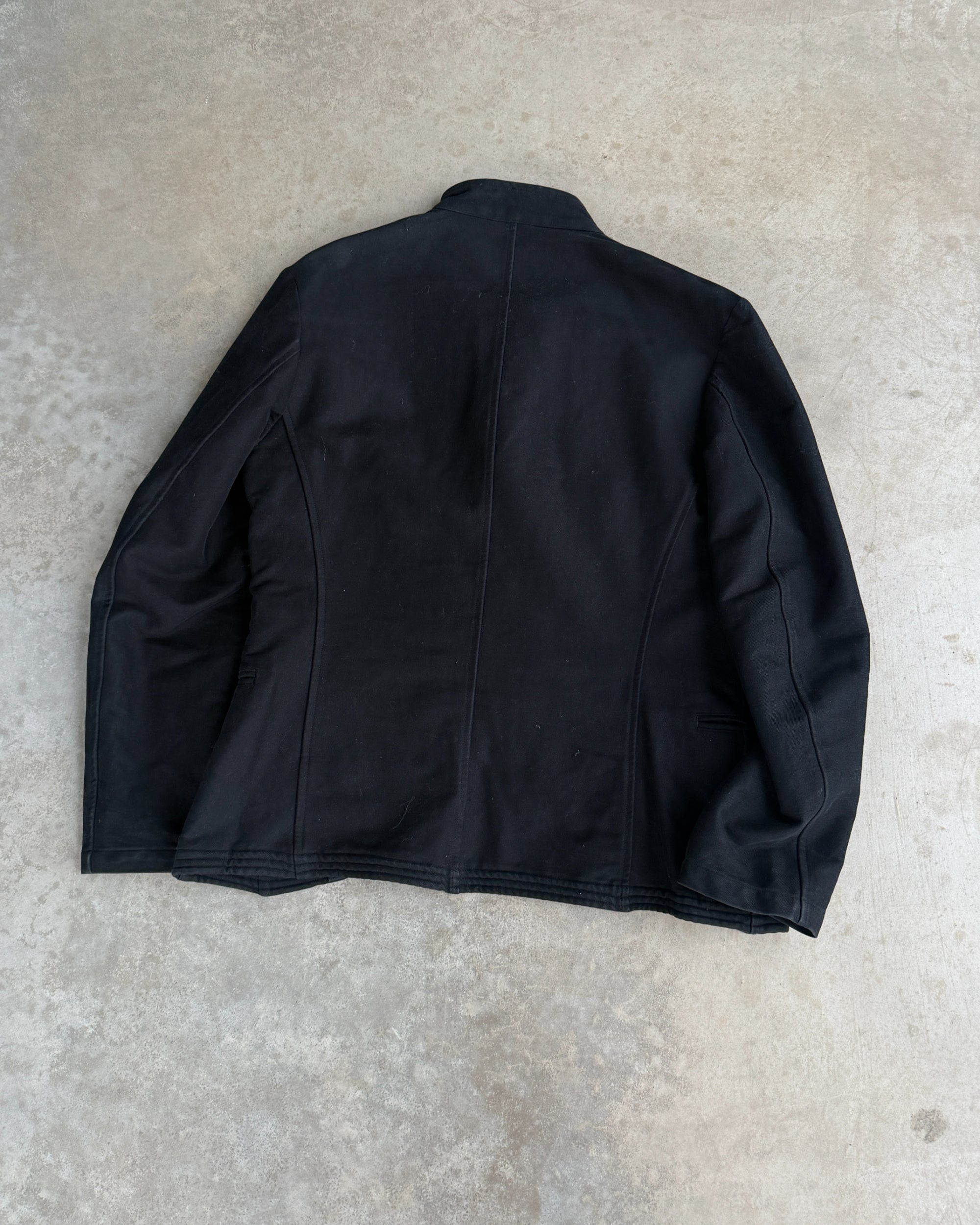 Yohji Yamamoto AW06 Asymmetric Cotton Jacket – S-on a concrete background