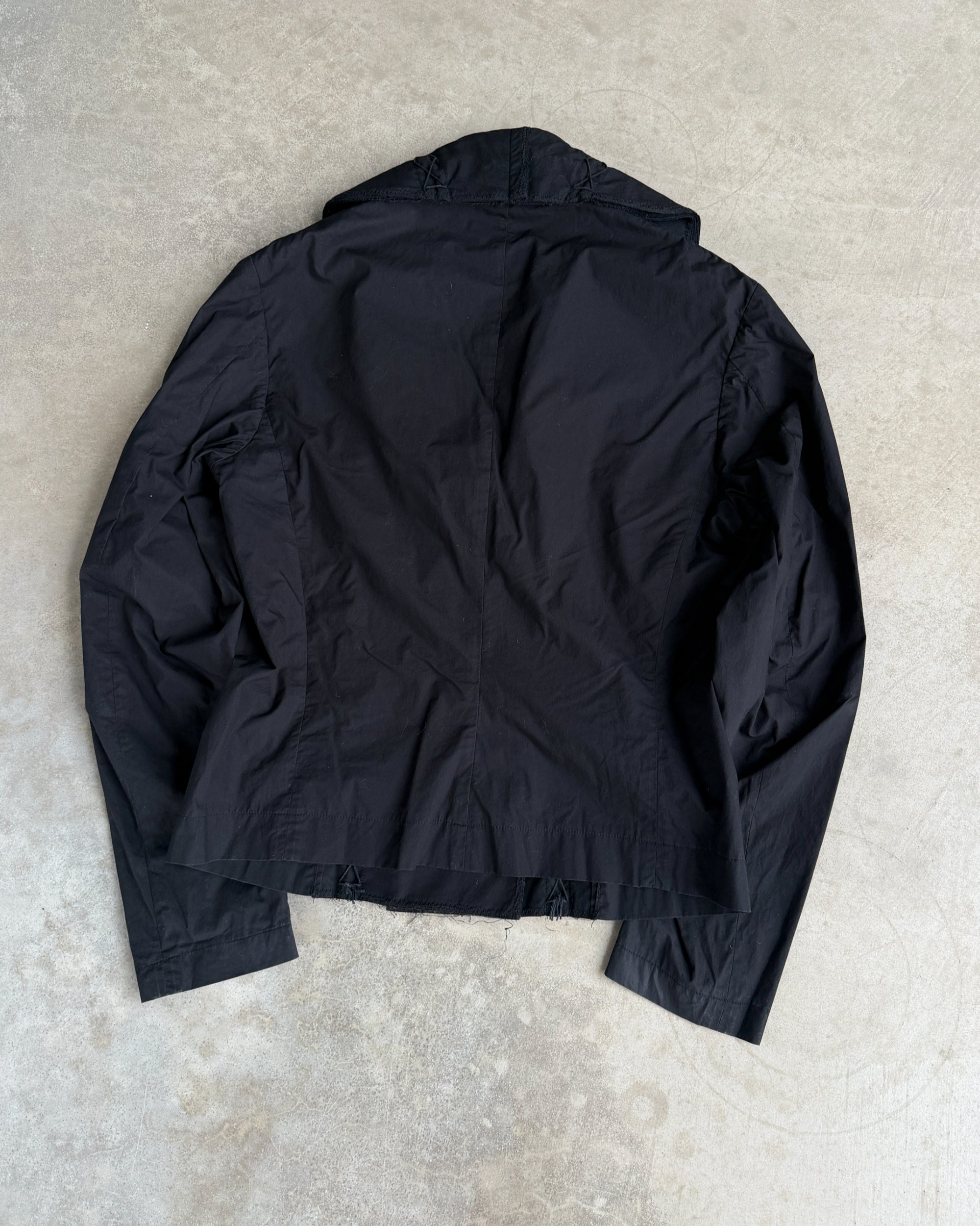 Issey Miyake SS03 Distressed Cotton Jacket – M-on a concrete background