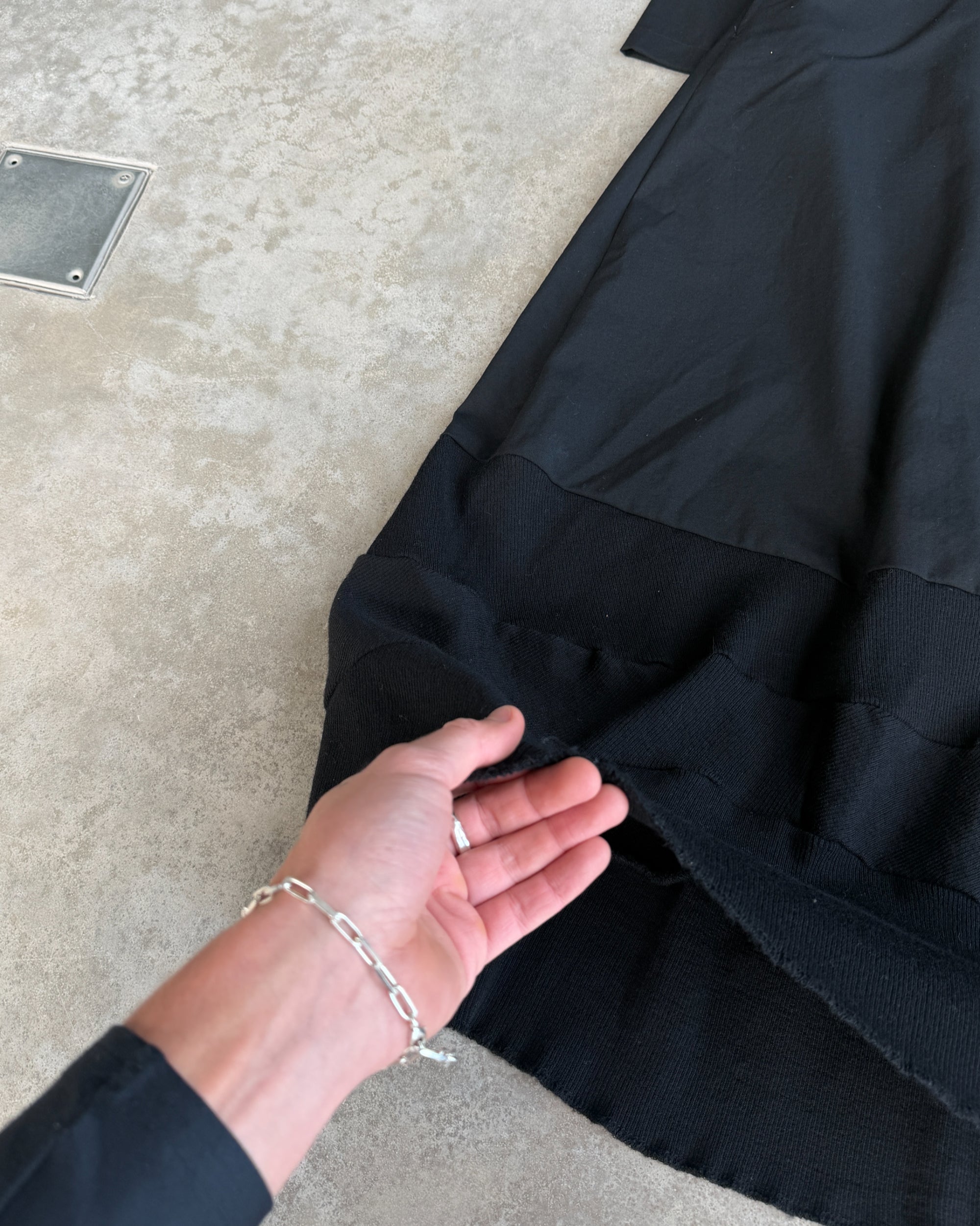 Comme des Garçons Tricot FW93 Wool Overcoat Dress – M-on a concrete background