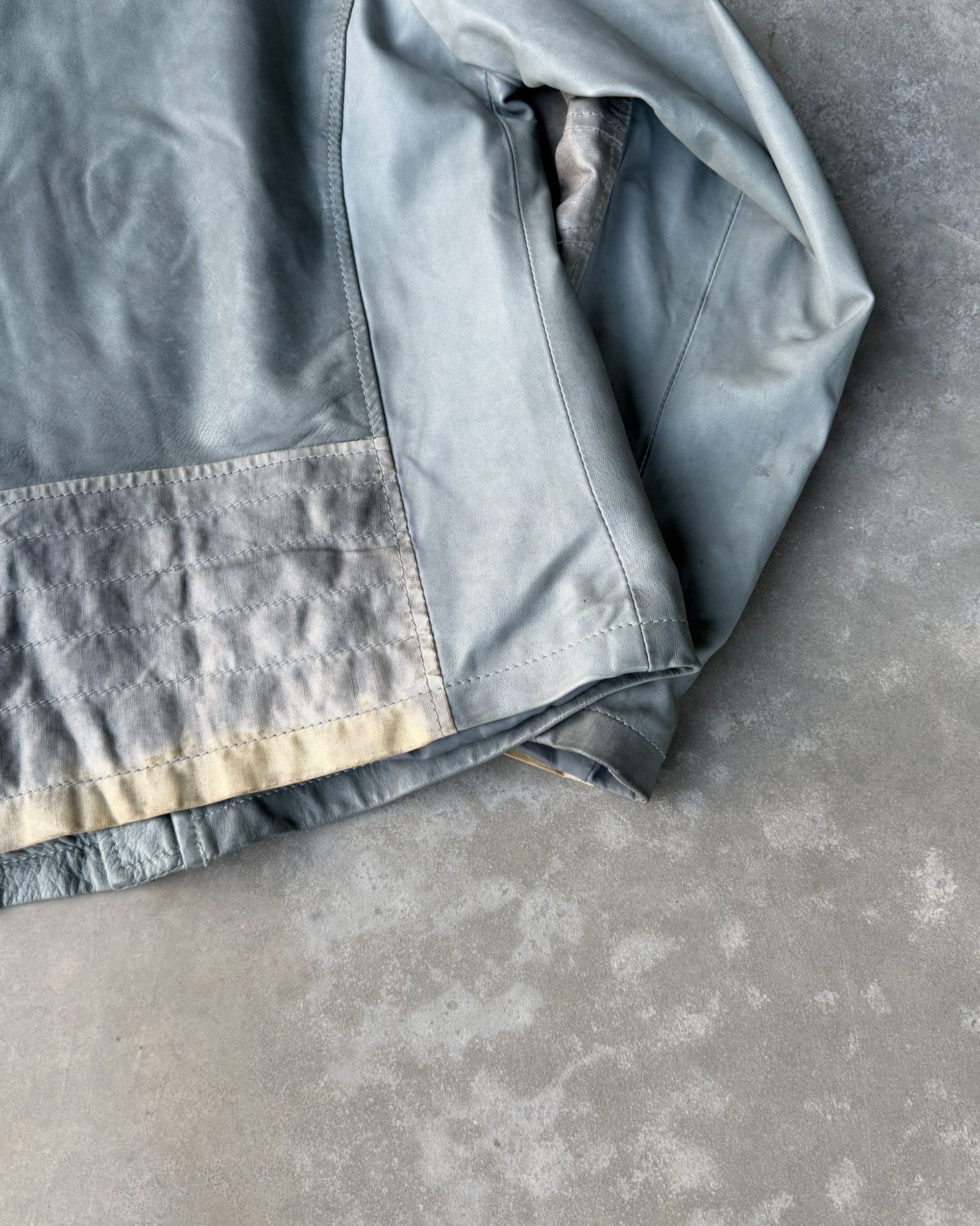 Armani Jeans Distressed Leather Jacket – L-on a concrete background
