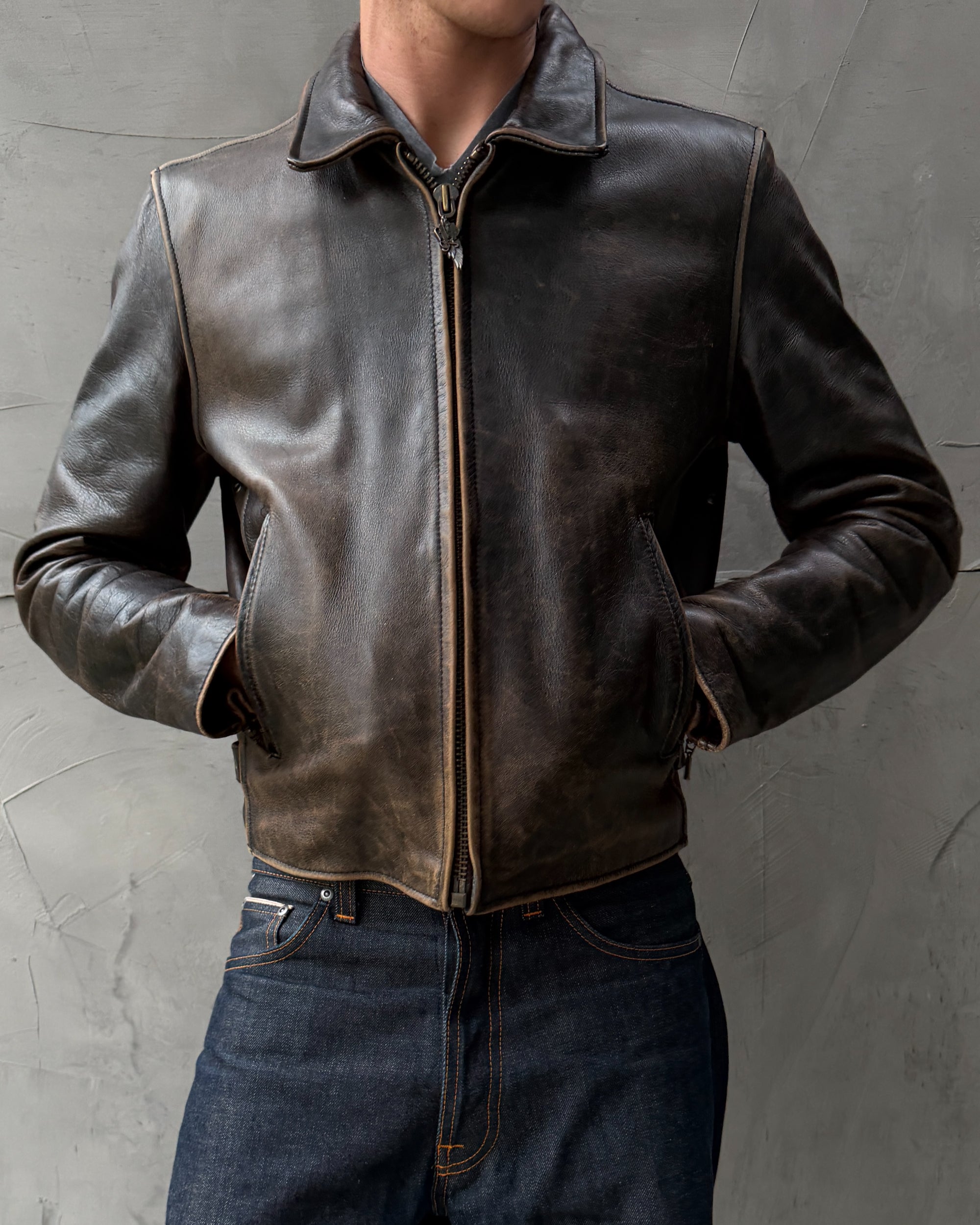 Harley Davidson 1990s Leather Jacket – M-on a concrete background