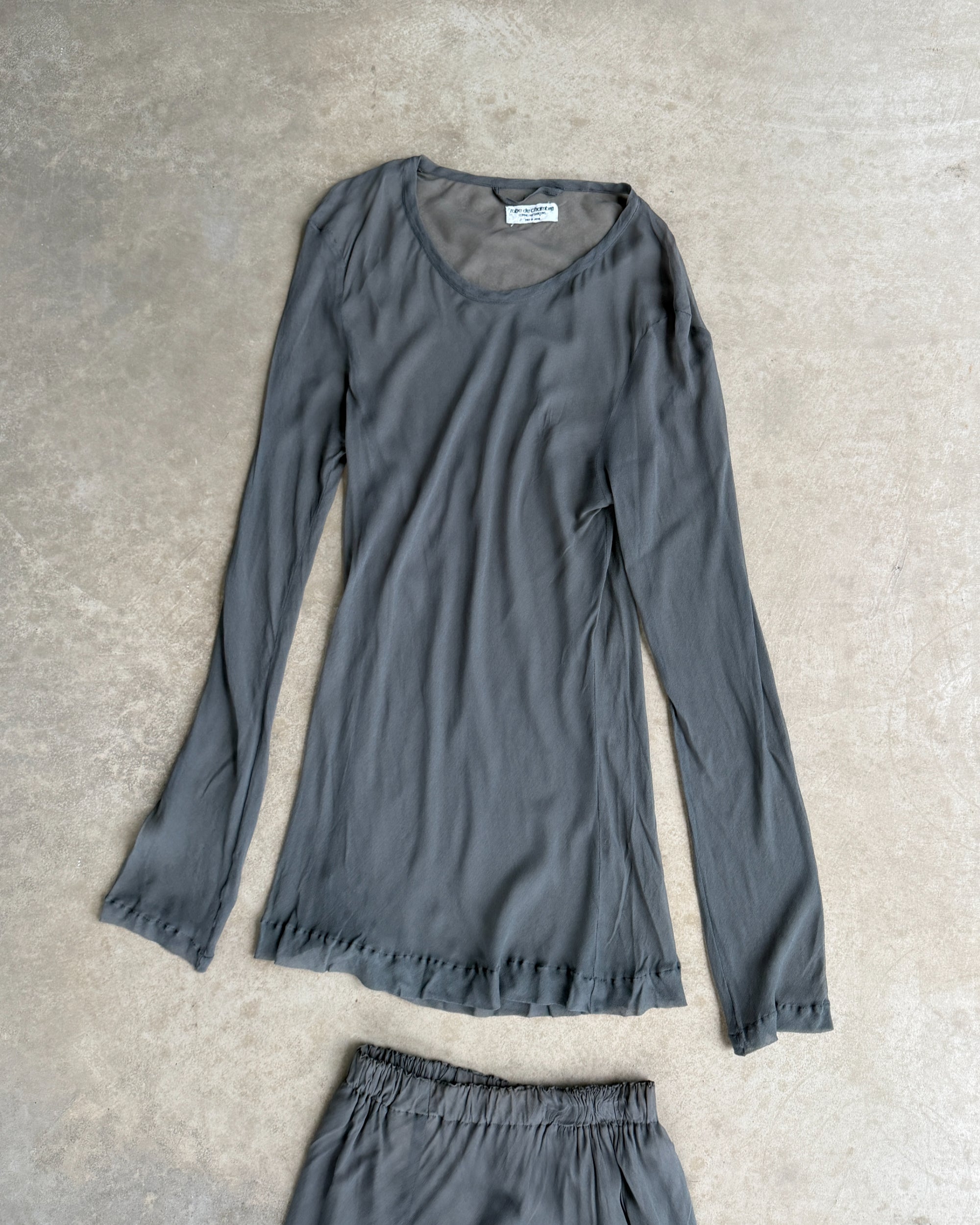 Comme des Garçons AW93 Robe de Chambre Mesh Top & Skirt Set– S-on a concrete background