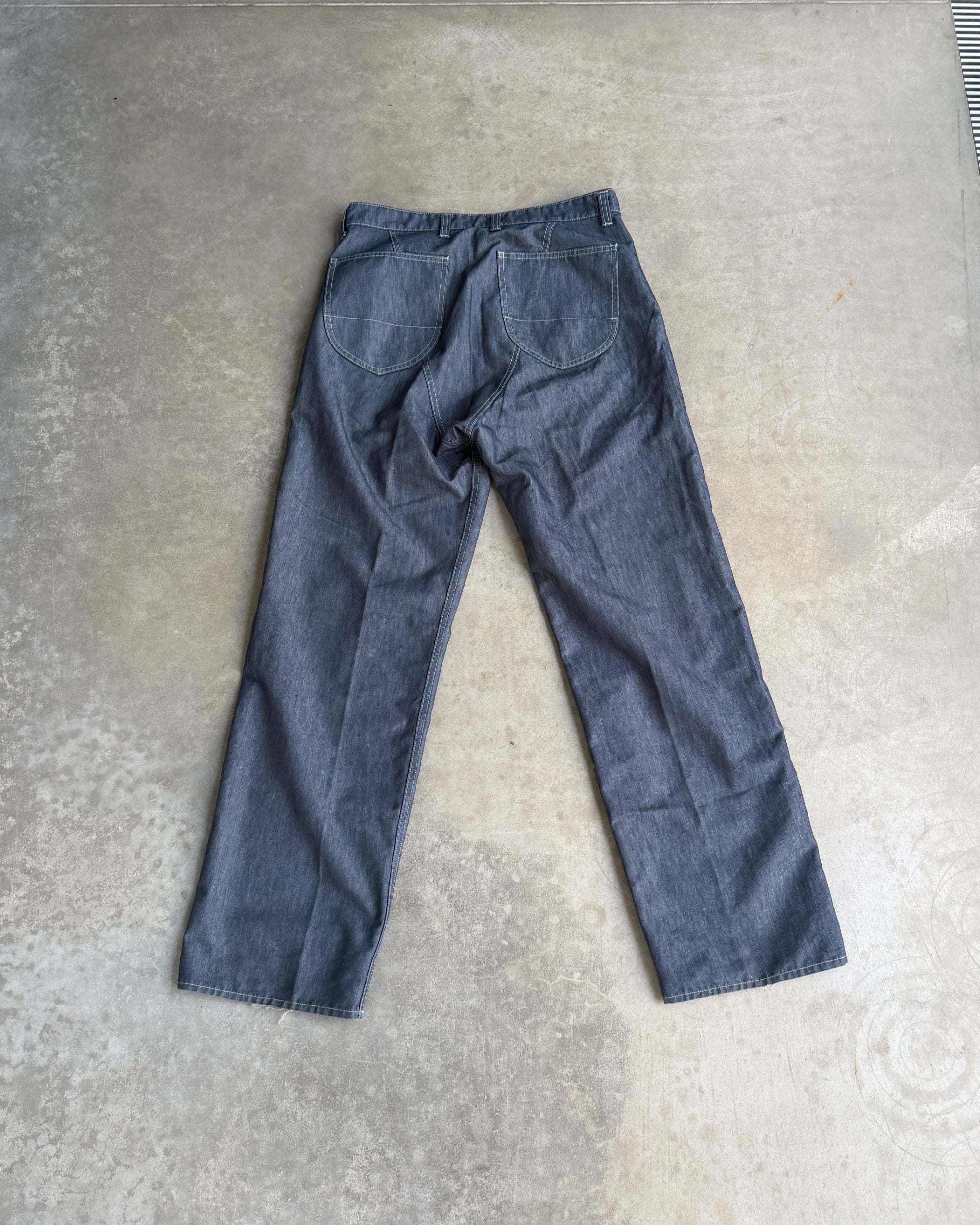 Issey Miyake AW2003 Wide Leg Chambray Denim Trousers – W33–34-on a concrete background