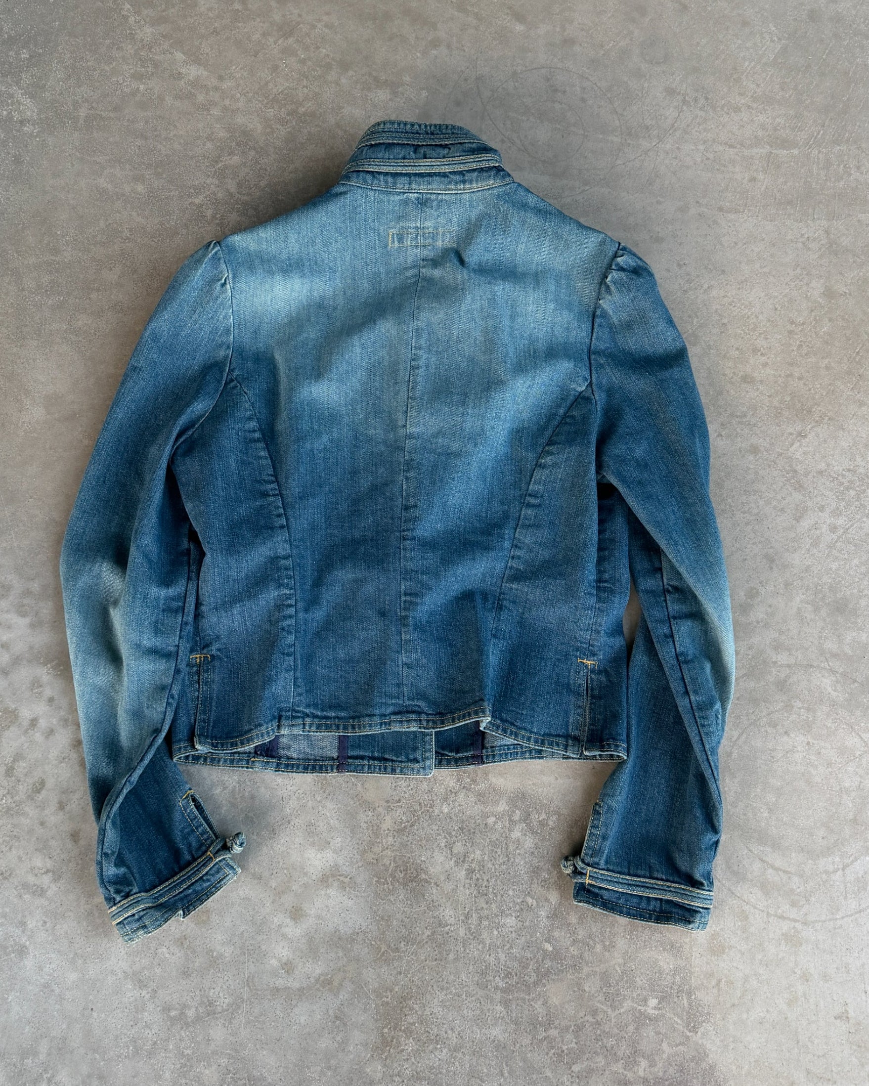 See by Chloé Hussar Denim Jacket – L-on a concrete background