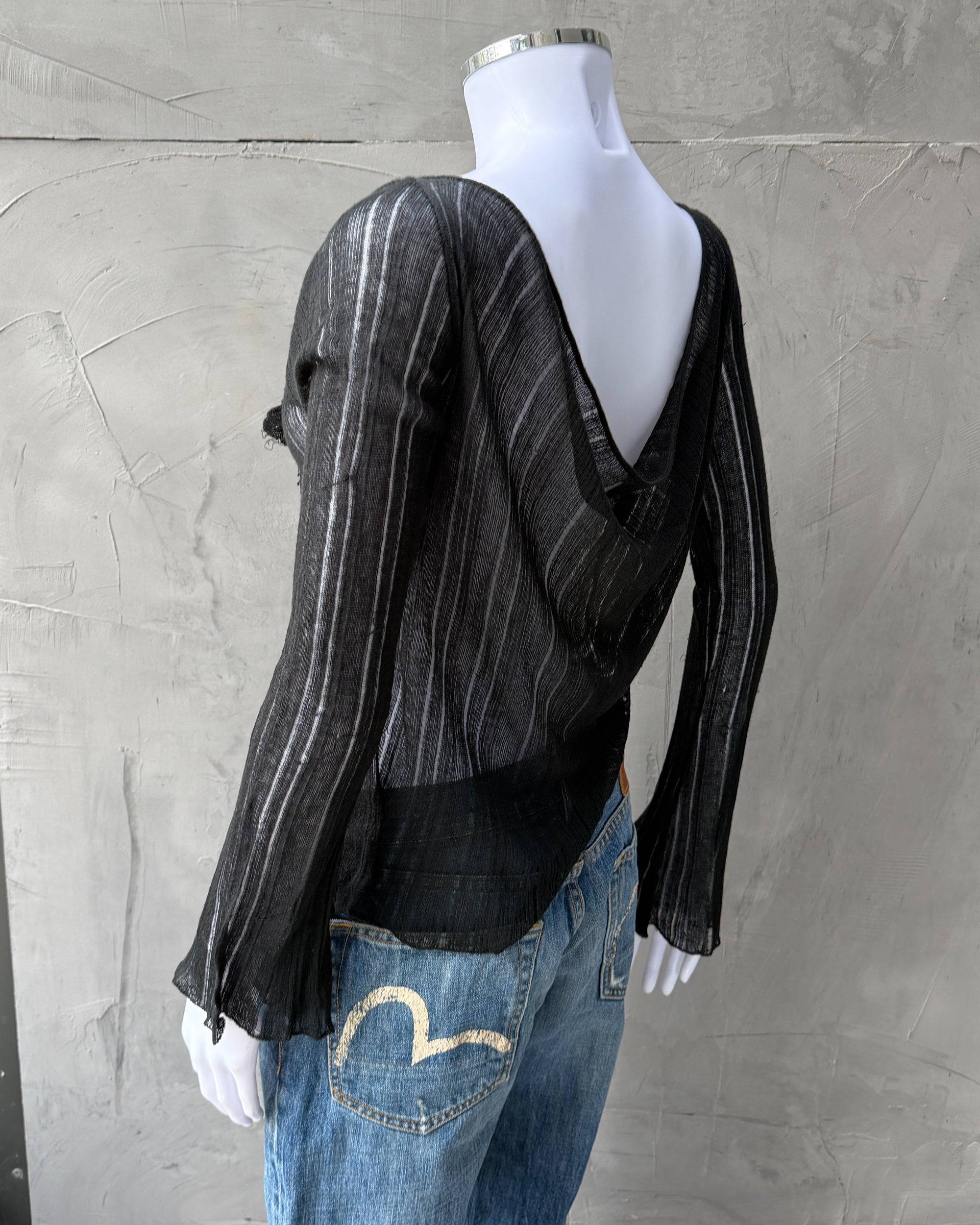 Alberta Ferretti Black Mesh Top – M–L-on a concrete background