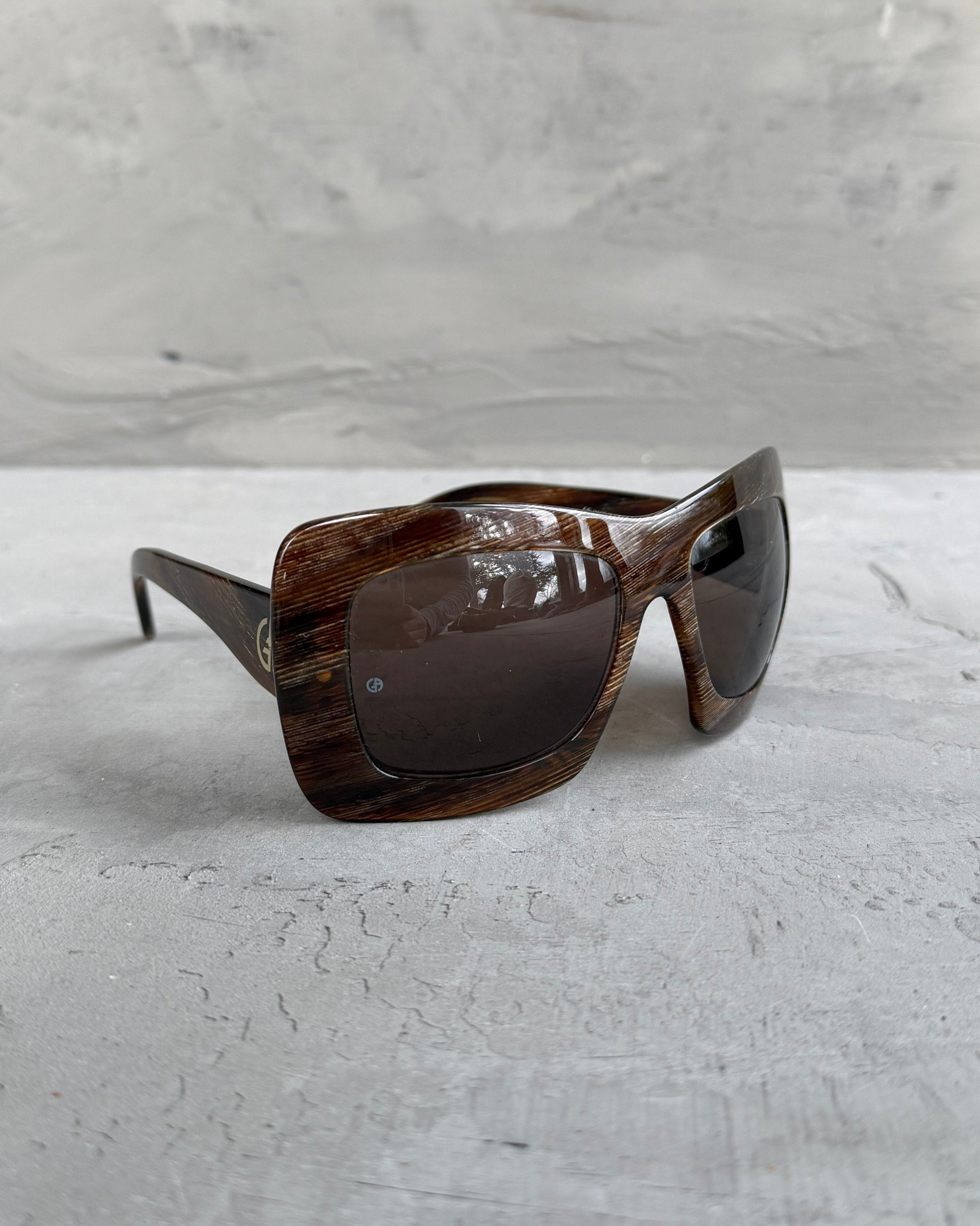Giorgio Armani Oversized Frame Sunglasses-on a concrete background