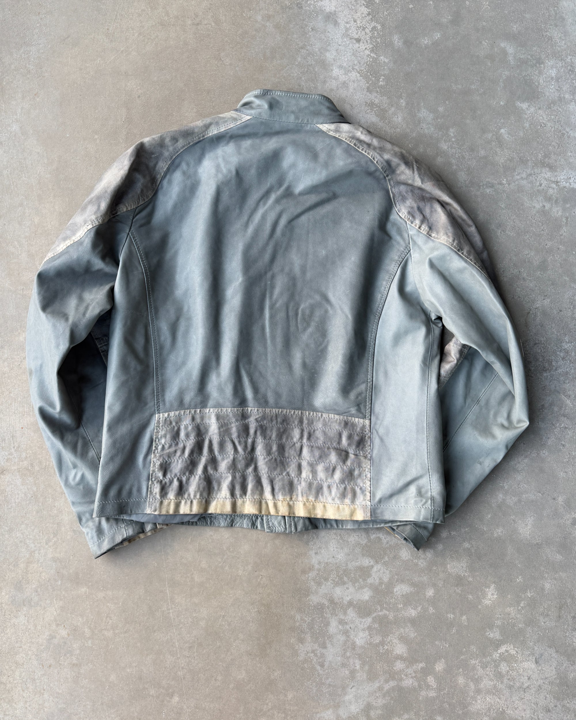 Armani Jeans Distressed Leather Jacket – L-on a concrete background