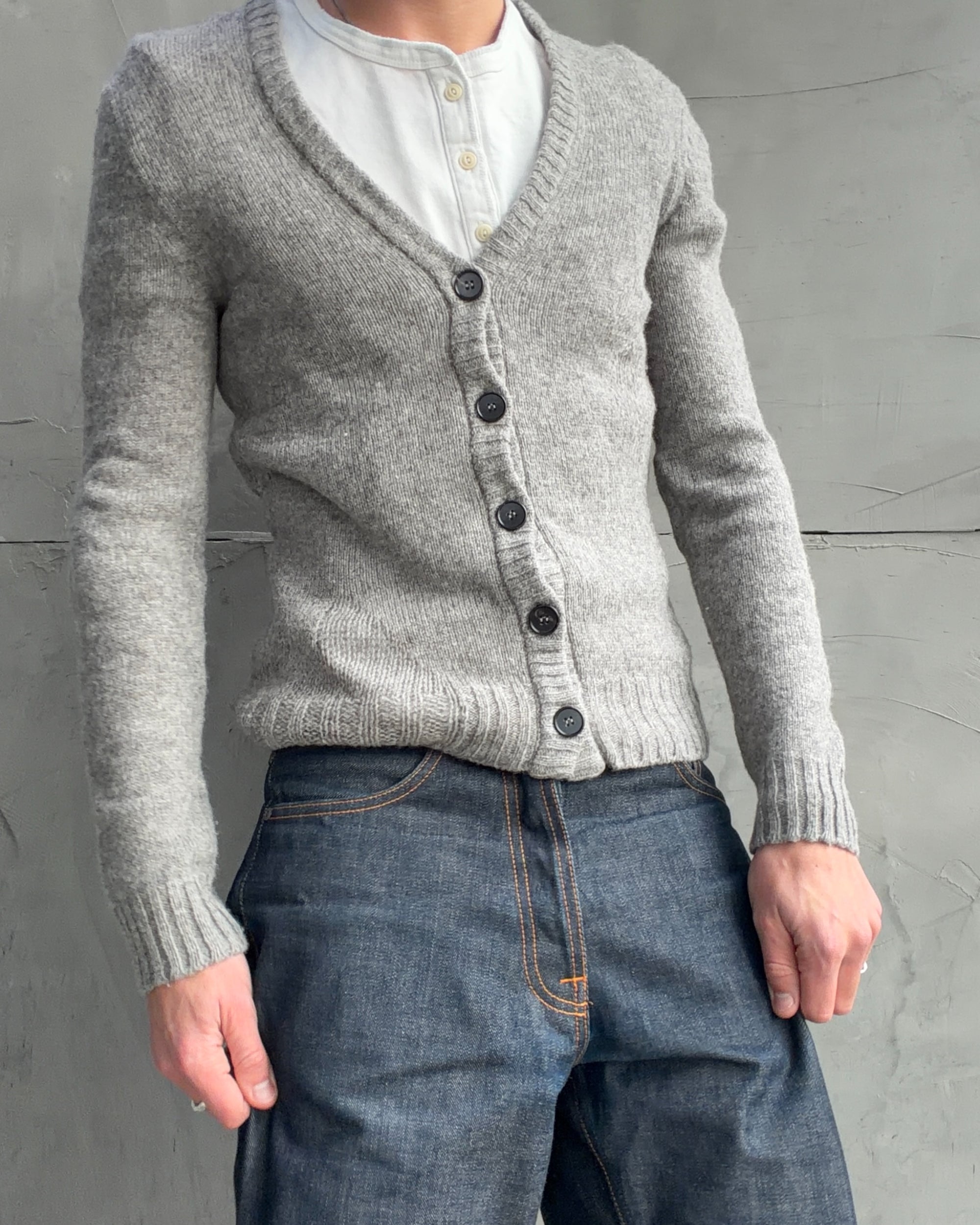 Maison Margiela 10 Wool Cardigan – S-on a concrete background