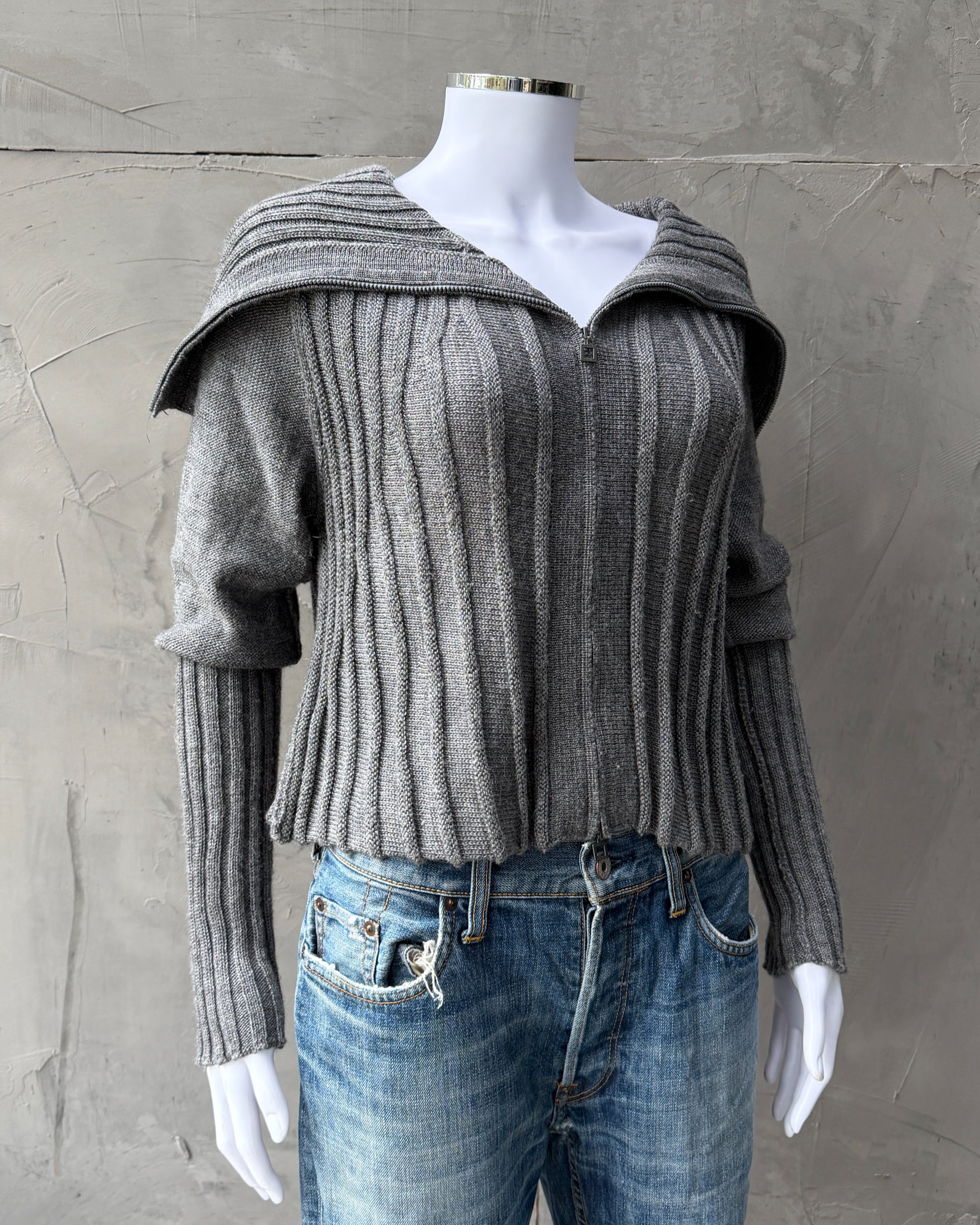 Sarah Pacini Zip-Down Cardigan – One Size-on a concrete background