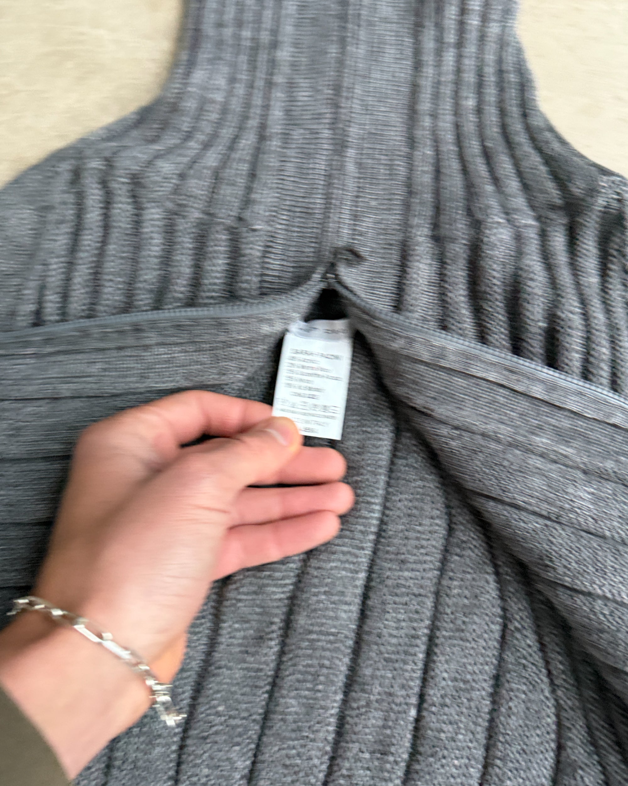Sarah Pacini Zip-Down Cardigan – One Size-on a concrete background