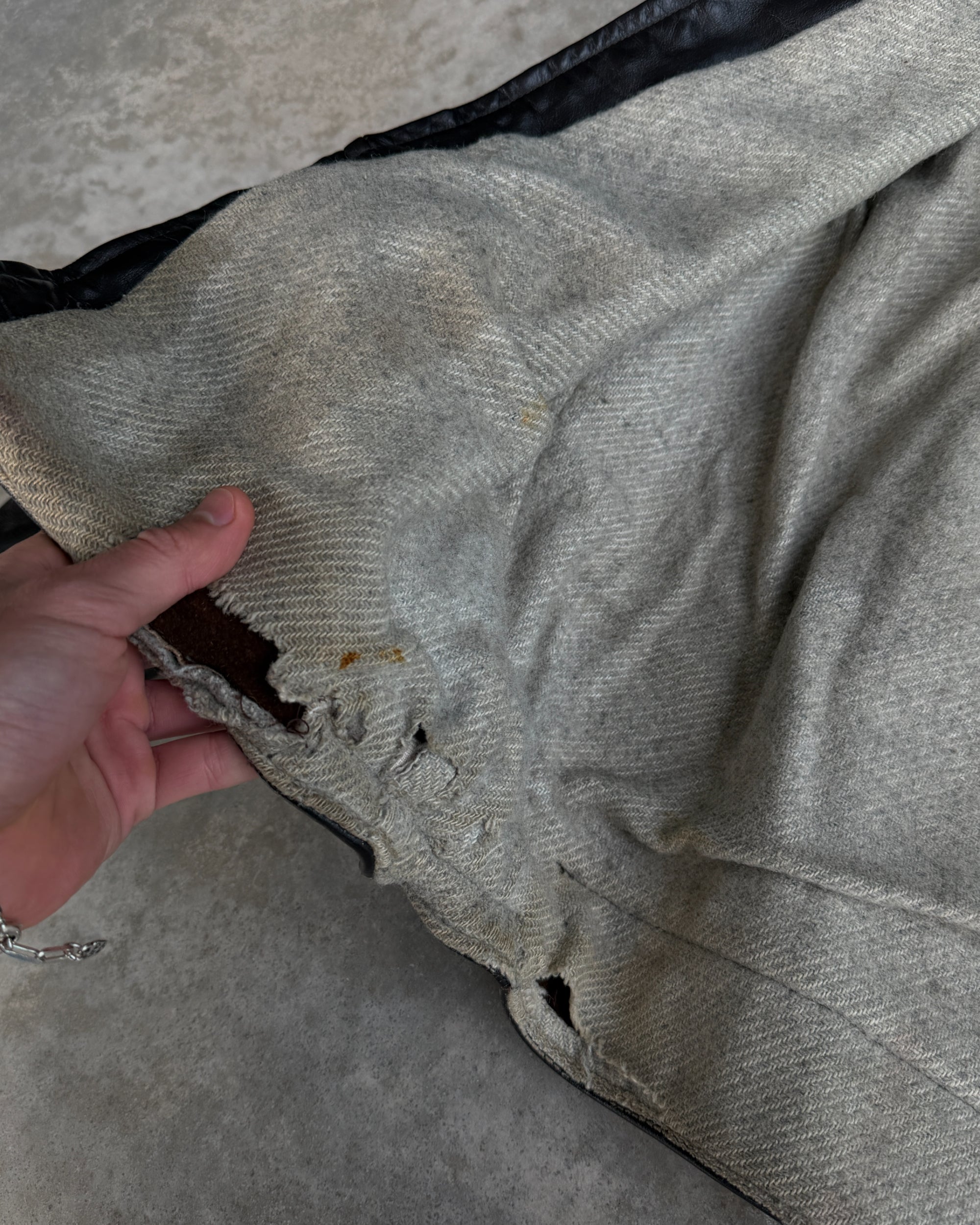 1970s Vintage Leather Jacket with Wool Lining – S-on a concrete background