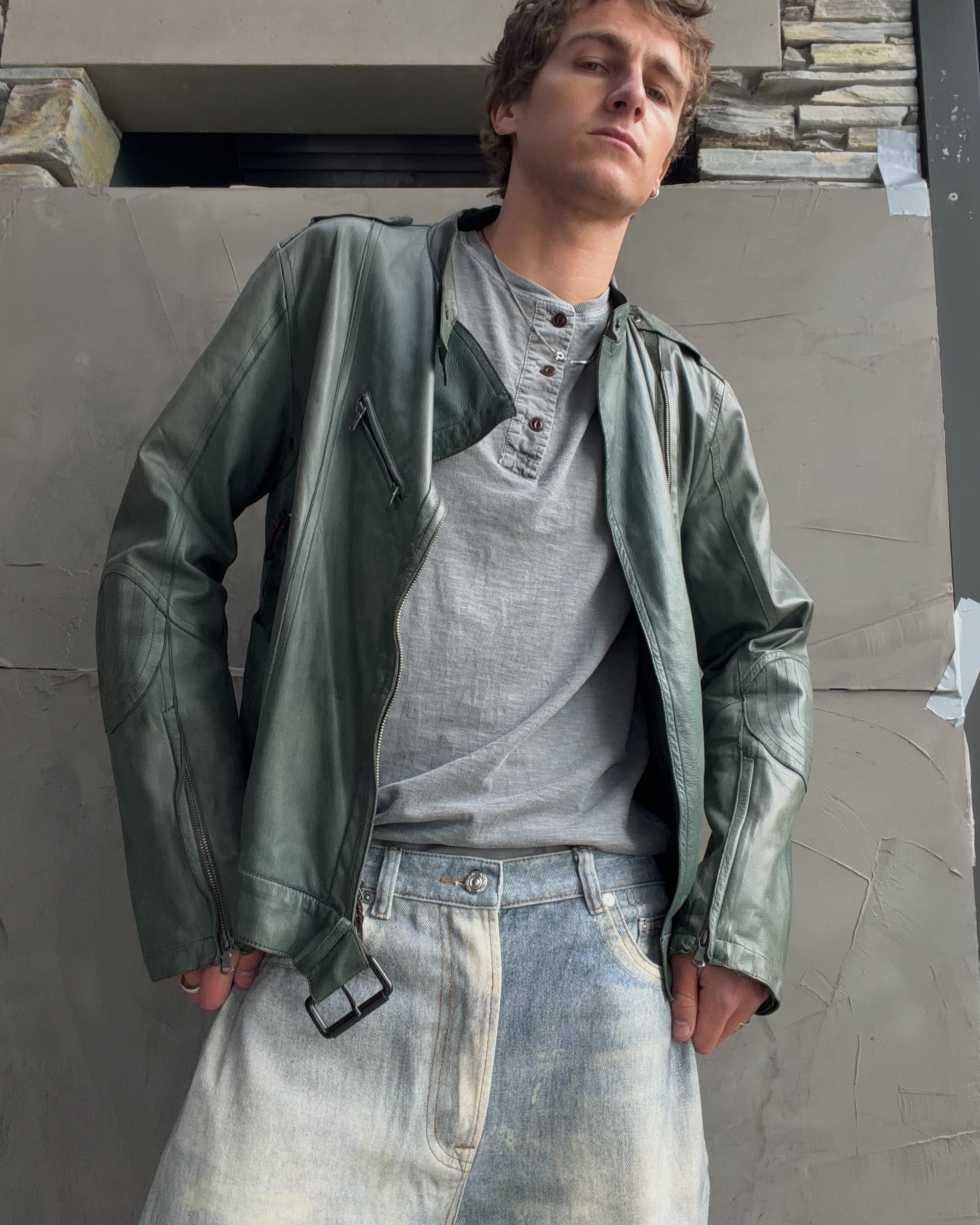 Costume National Homme Green Leather Biker Jacket – M-on a concrete background