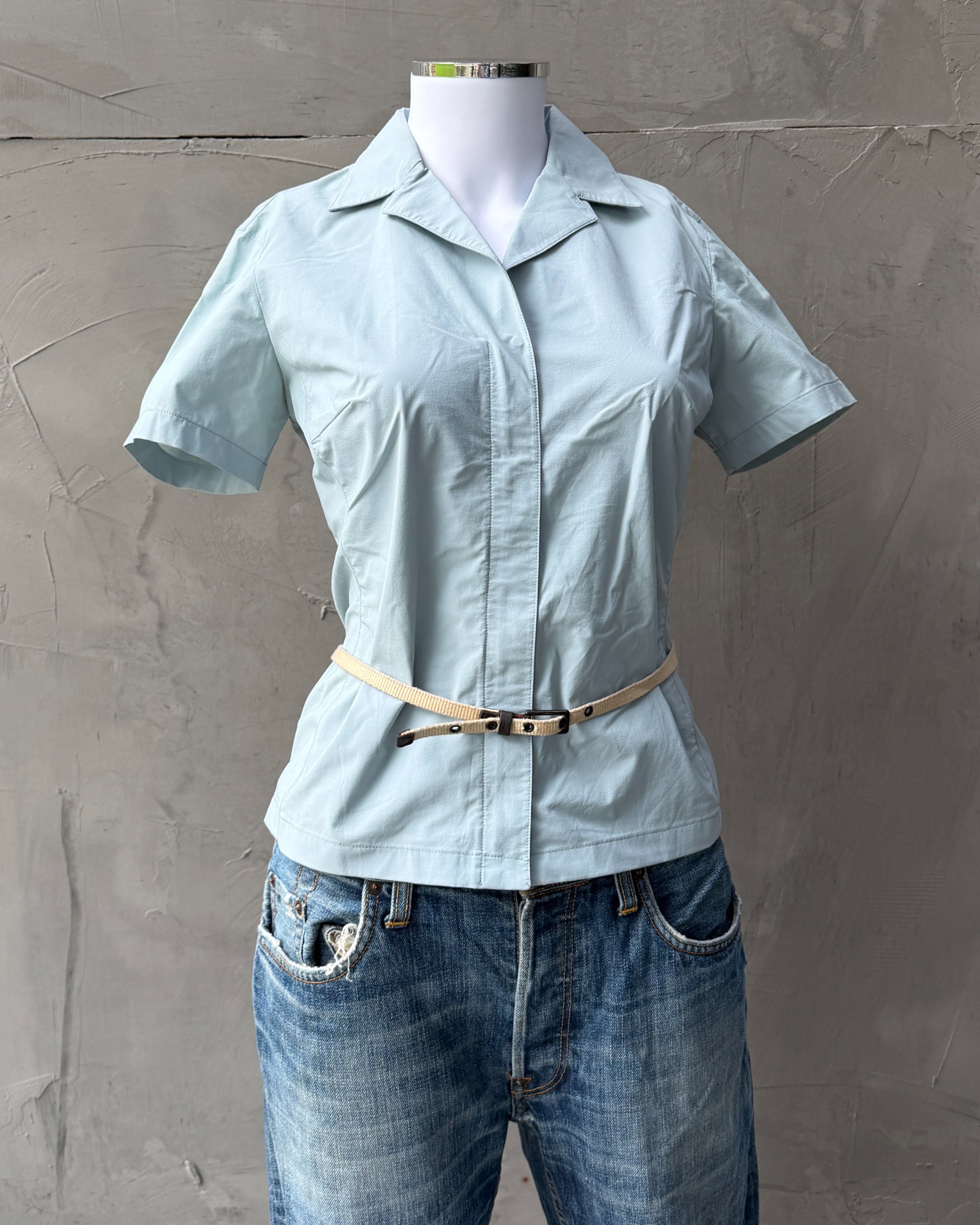 Prada SS99 Belted Nylon Short Sleeve Shirt – S-on a concrete background