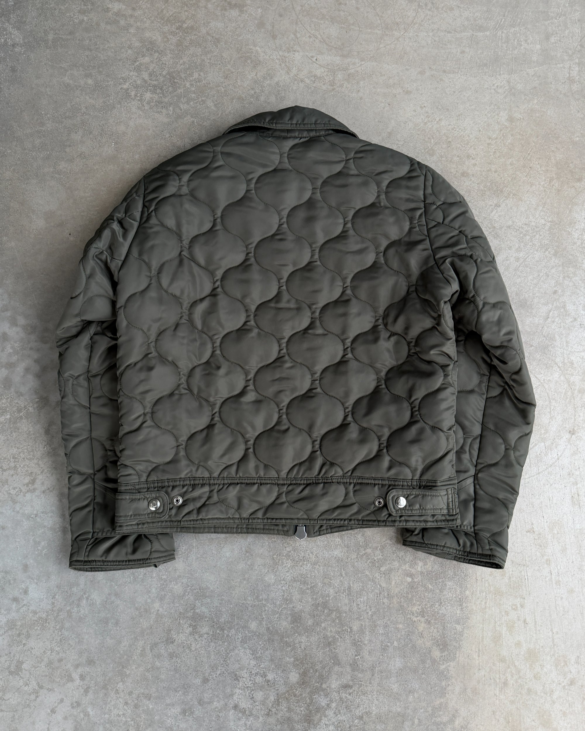 Monitaly Fireman Clasp Padded Jacket – M-on a concrete background
