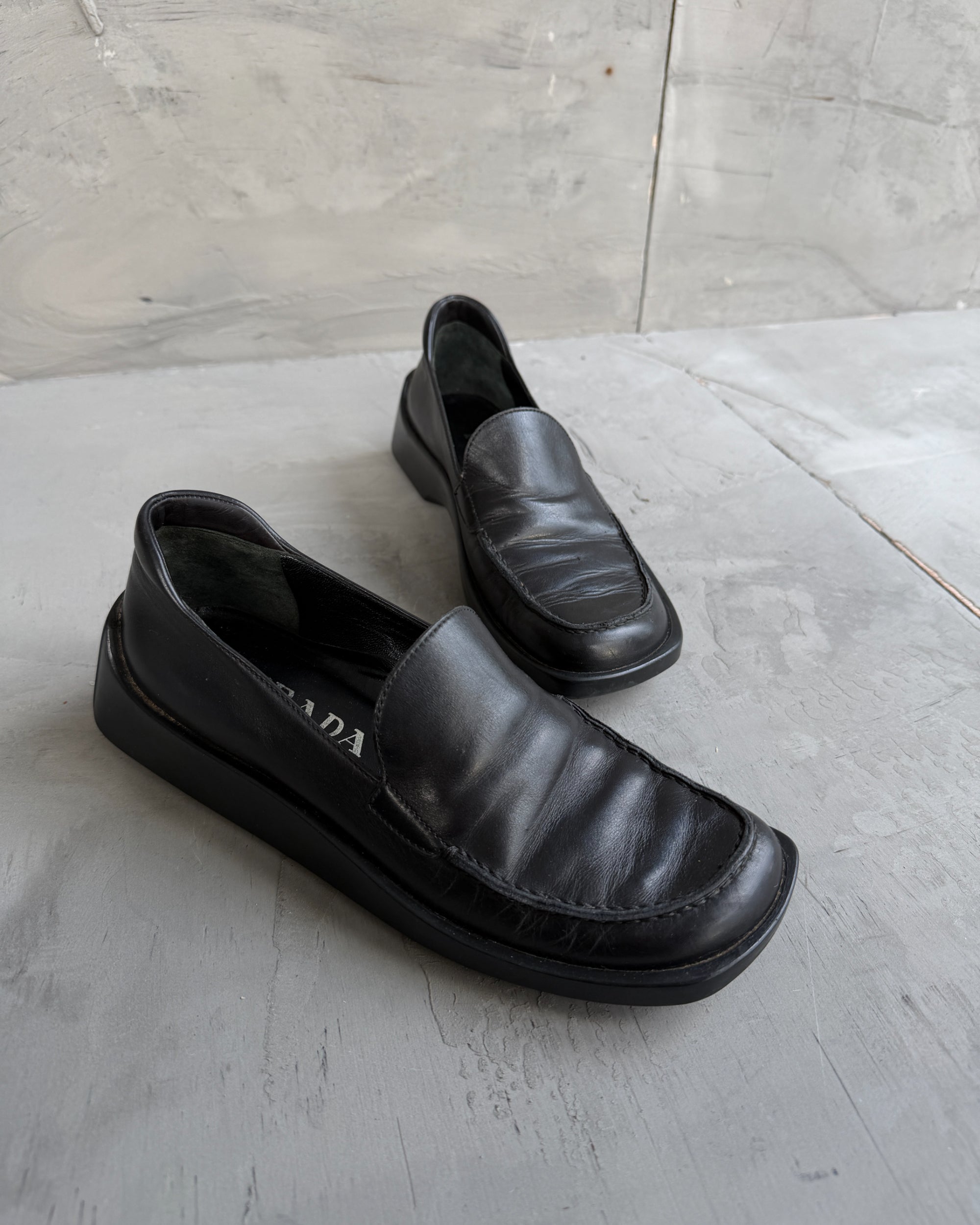 Prada FW99 Leather Extended Sole Loafers – EU 36-on a concrete background
