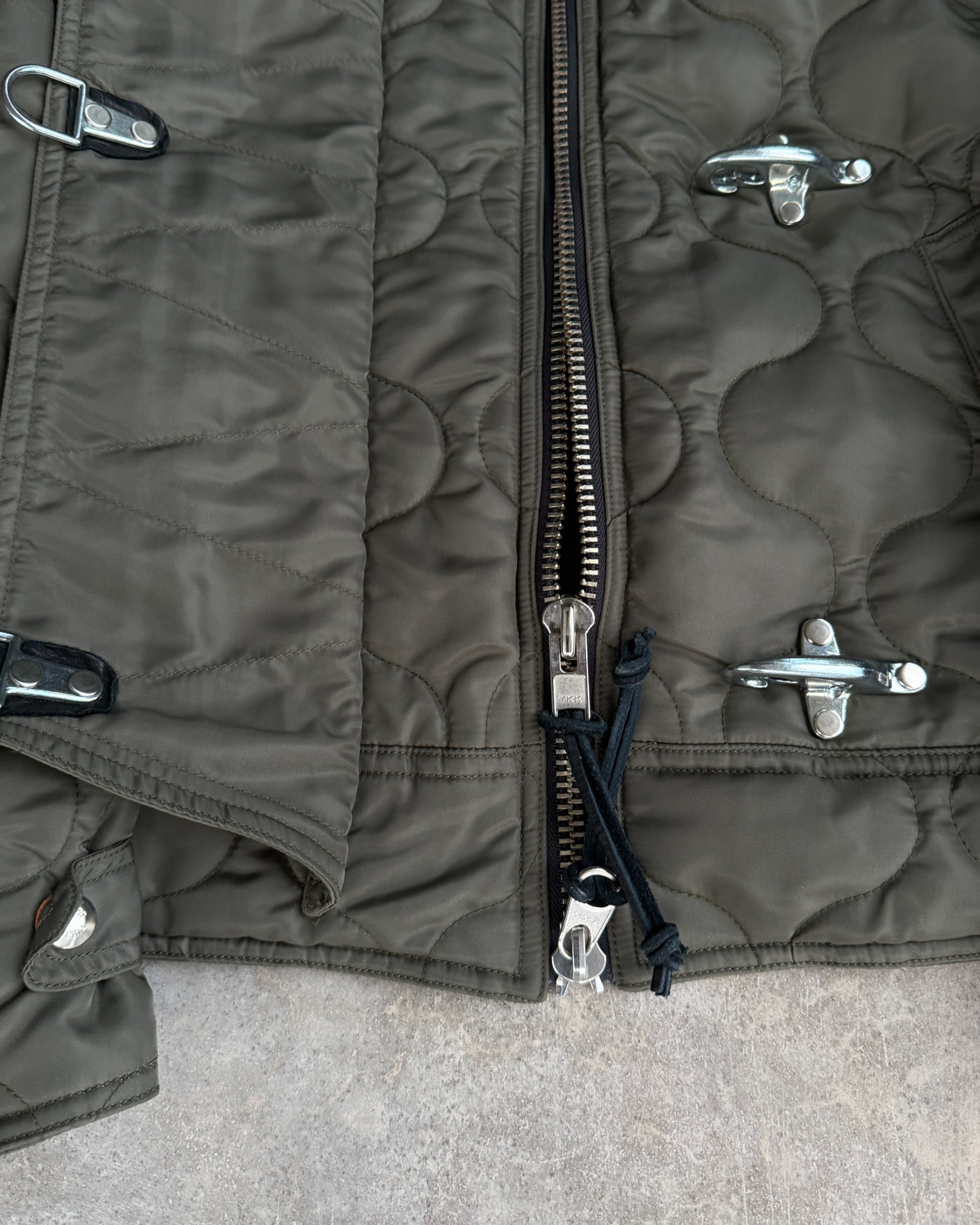 Monitaly Fireman Clasp Padded Jacket – M-on a concrete background