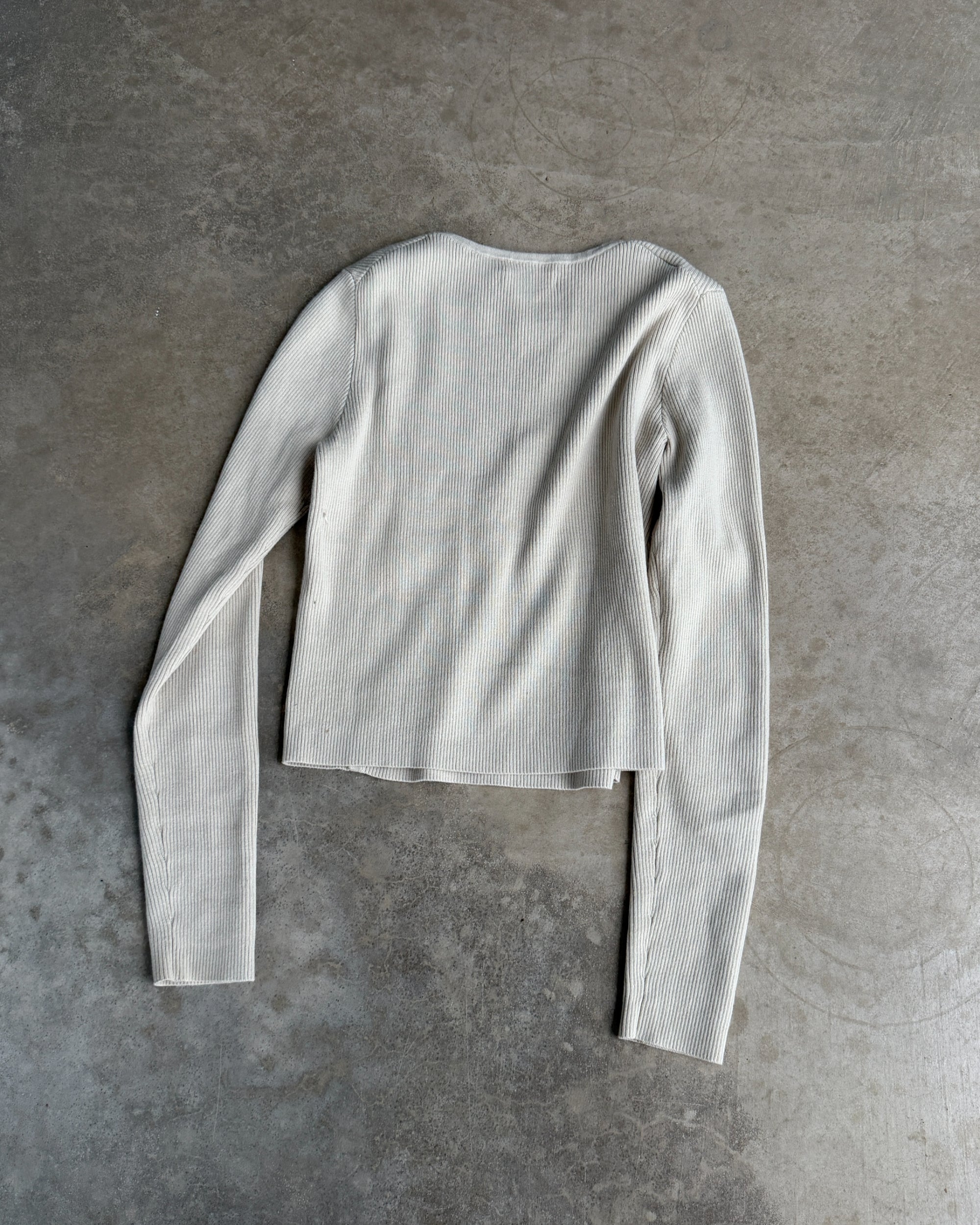 Calvin Klein Jeans Asymmetric Ribbed Cardigan – S-on a concrete background