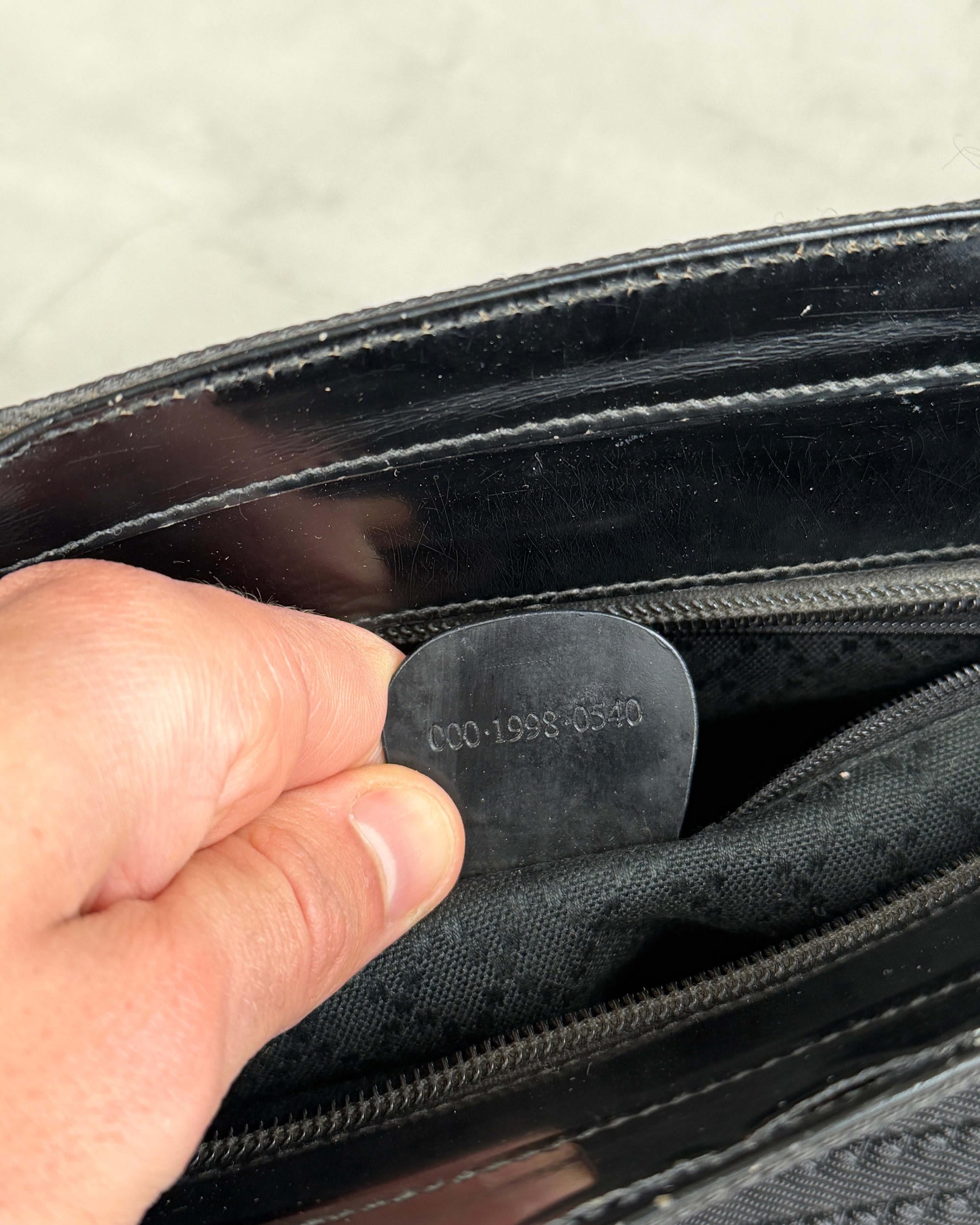 Gucci Bamboo Handle Handbag-on a concrete background