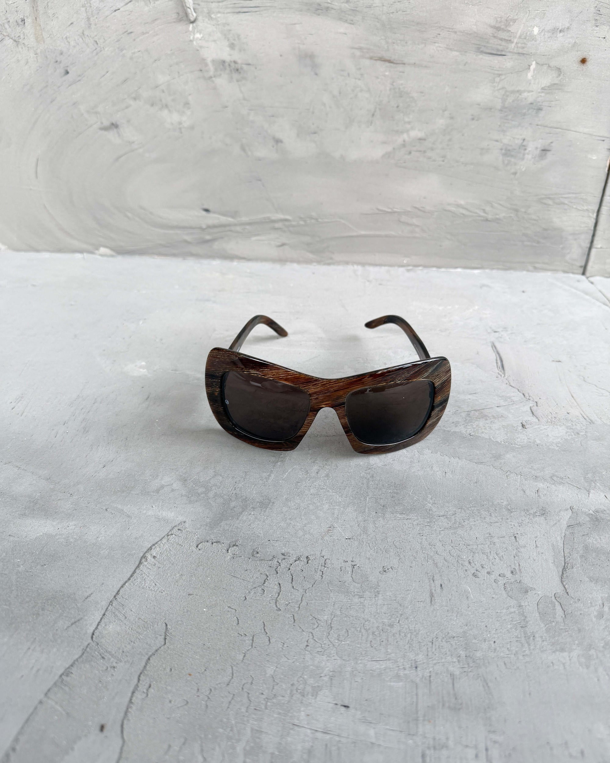 Giorgio Armani Oversized Frame Sunglasses-on a concrete background