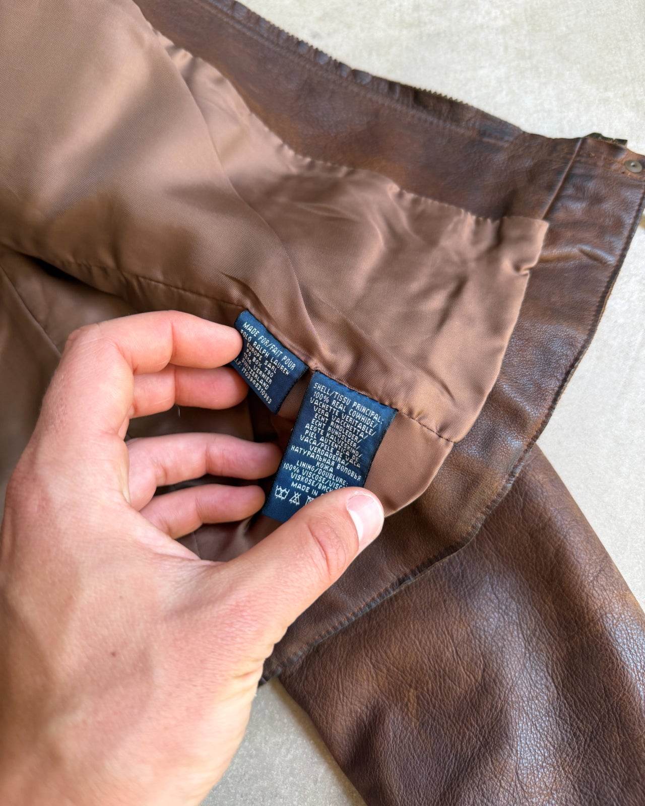 Ralph Lauren Brown Cowhide Leather Jacket – S-on a concrete background
